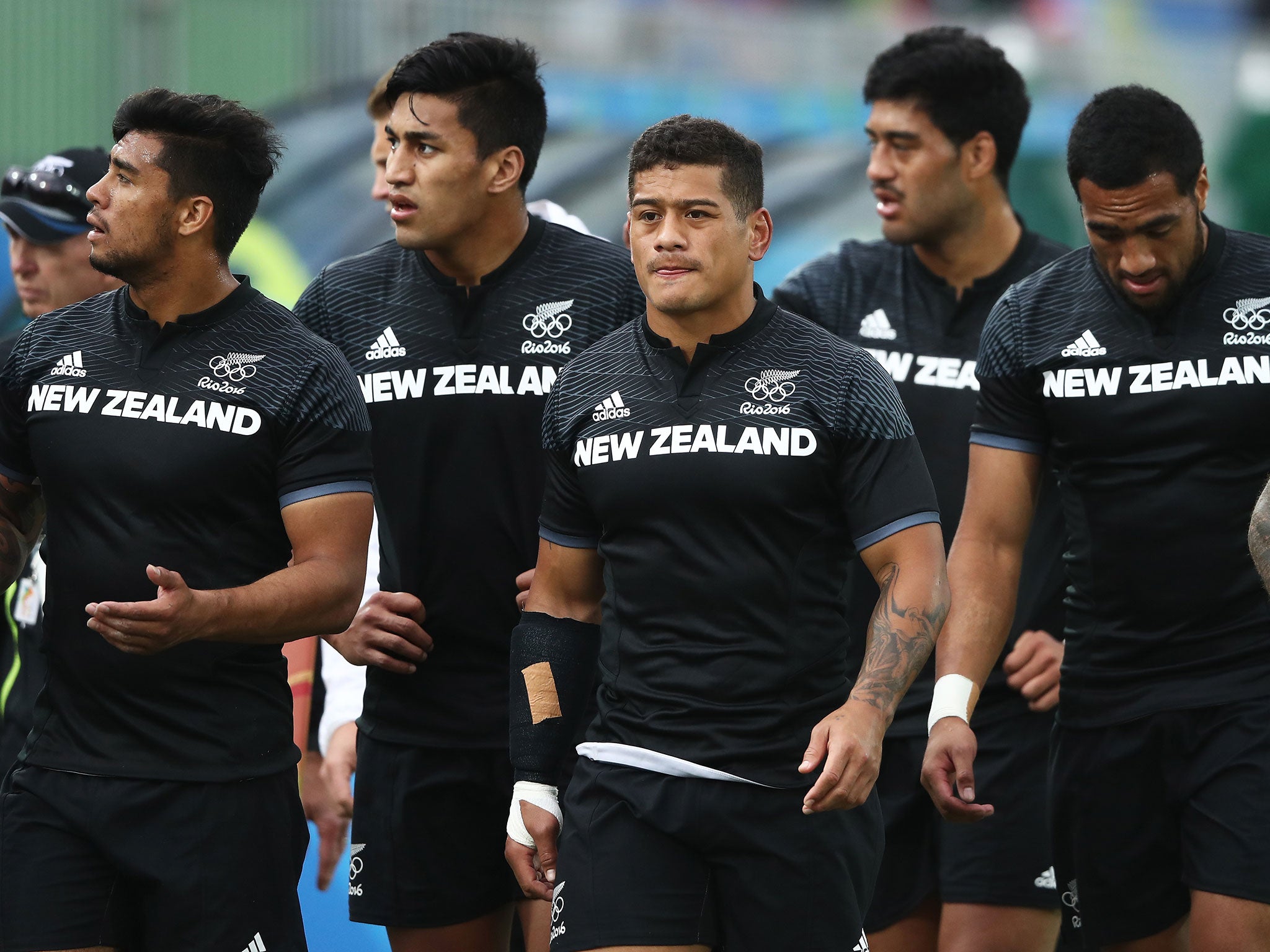 New Zealand's players walk off dejected after defeat to Great Britain