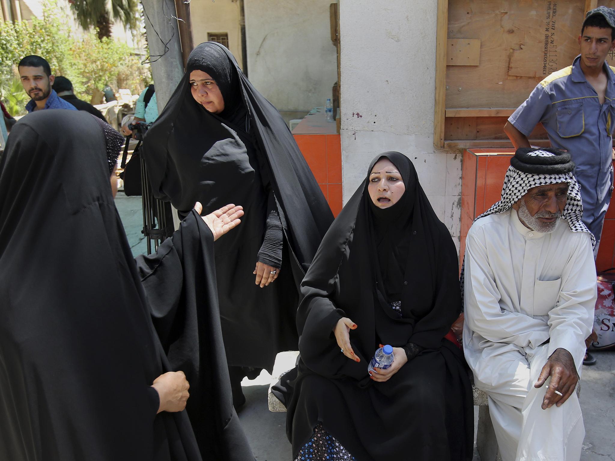 Parents outside Yarmouk hospital on 10 August