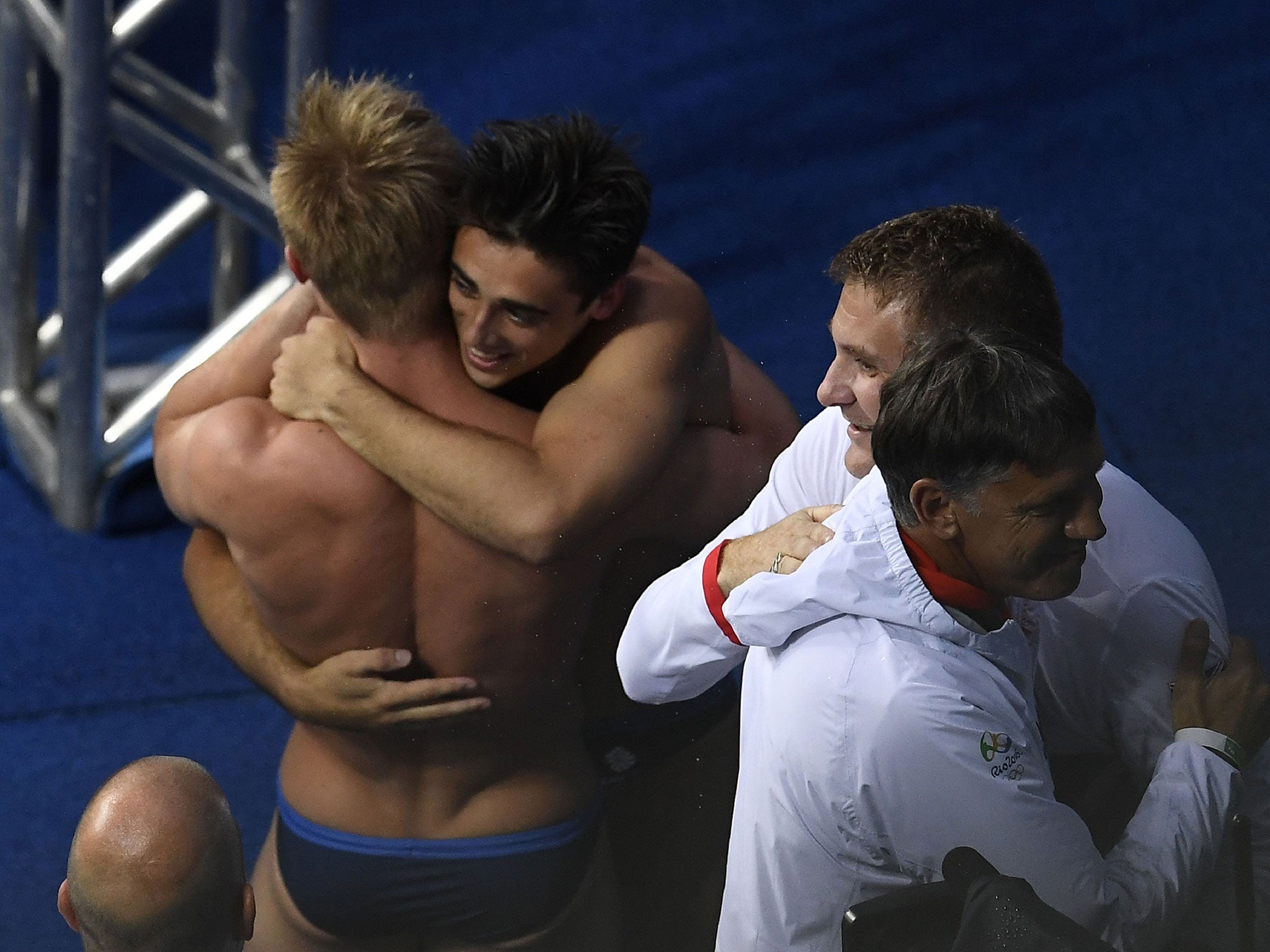 Laugher and Mears embrace after confirmation of their gold