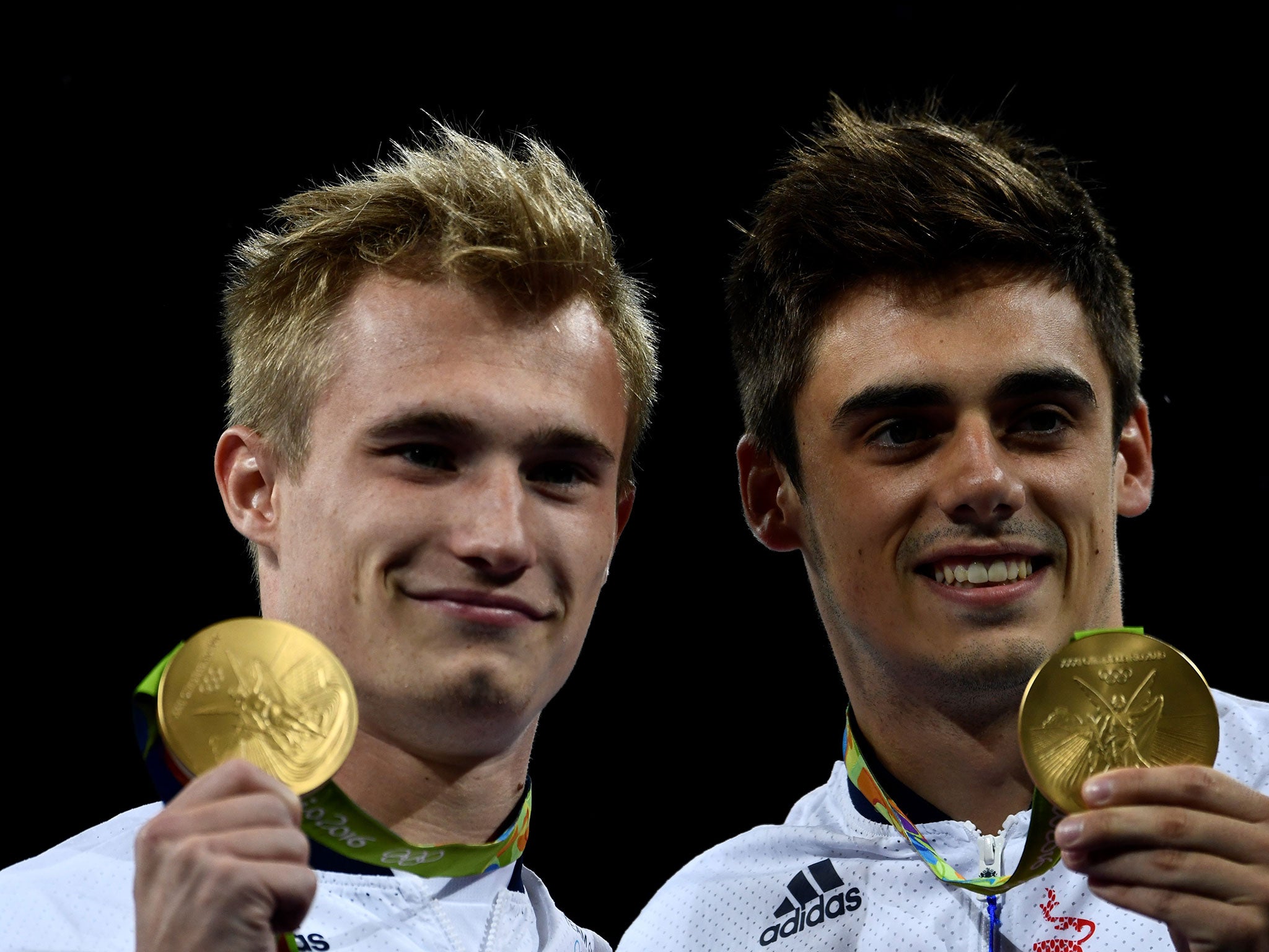 Mears and Laugher celebrate with their gold medals