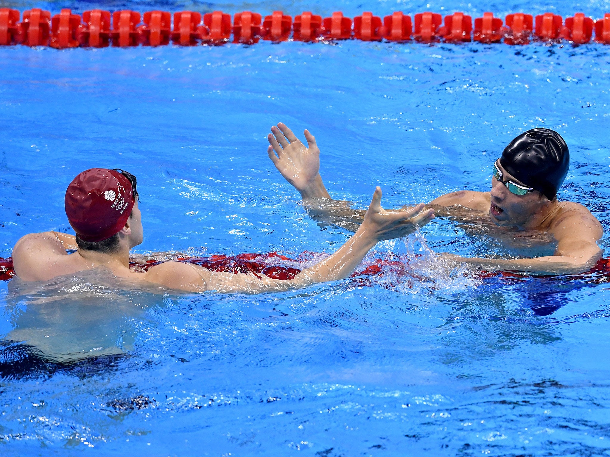 Guy and Phelps acknowledge each other after battling it out on the last length