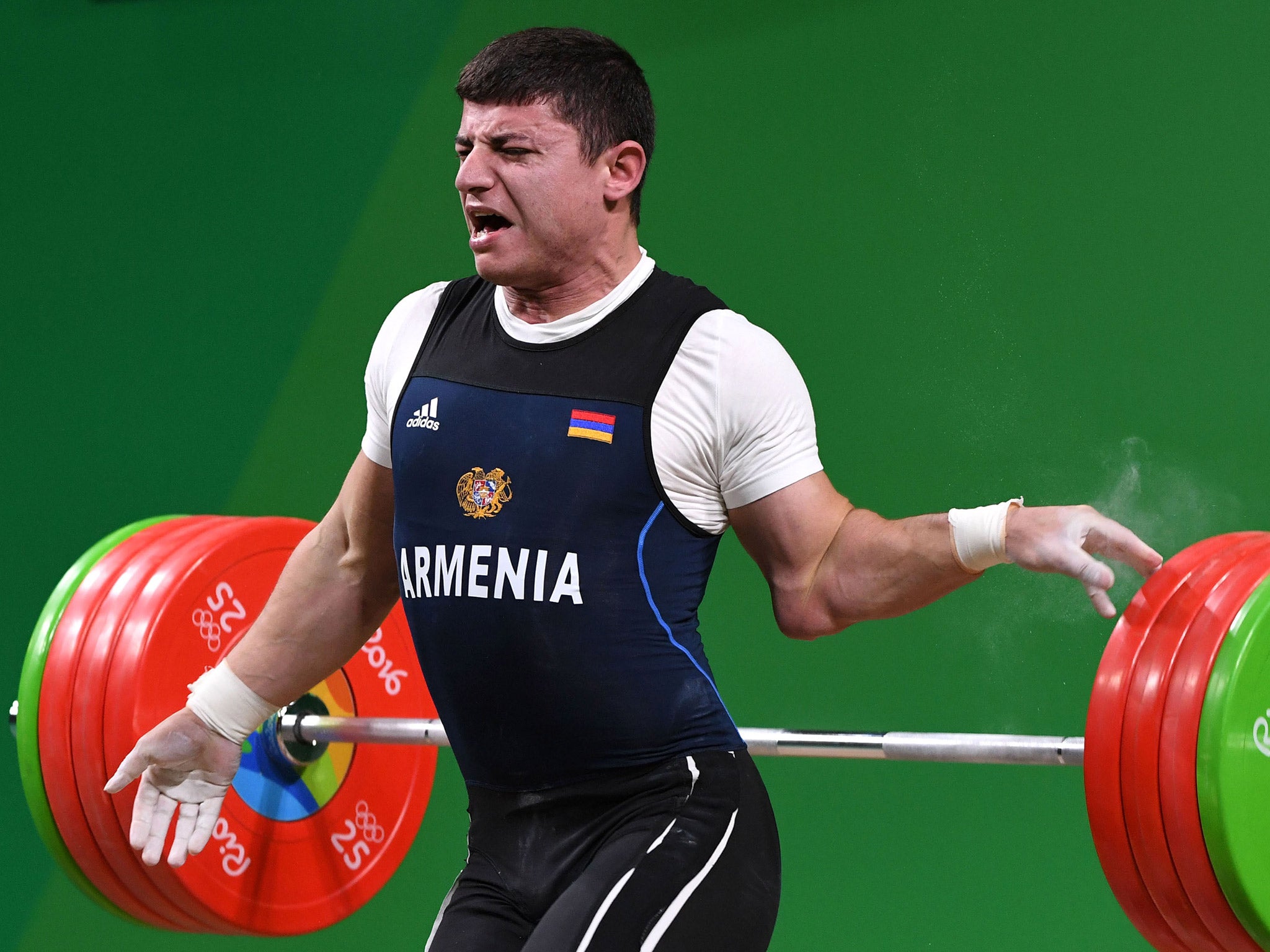 Karapetyan suffered the dislocated elbow in the men's 77kg weightlifting final