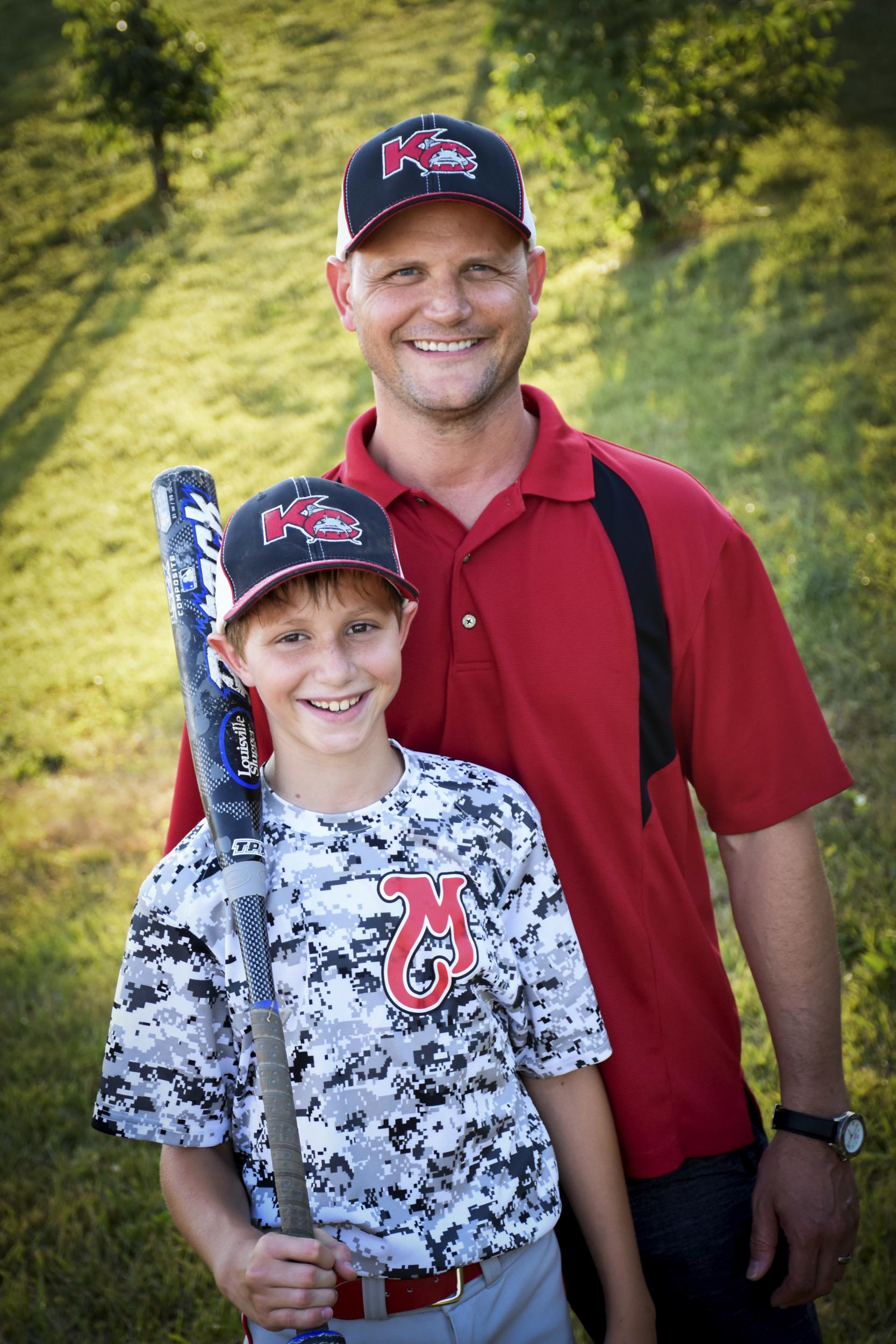 Caleb Thomas Schwab posing with his father Scott Schwab, a Kansas state lawmaker