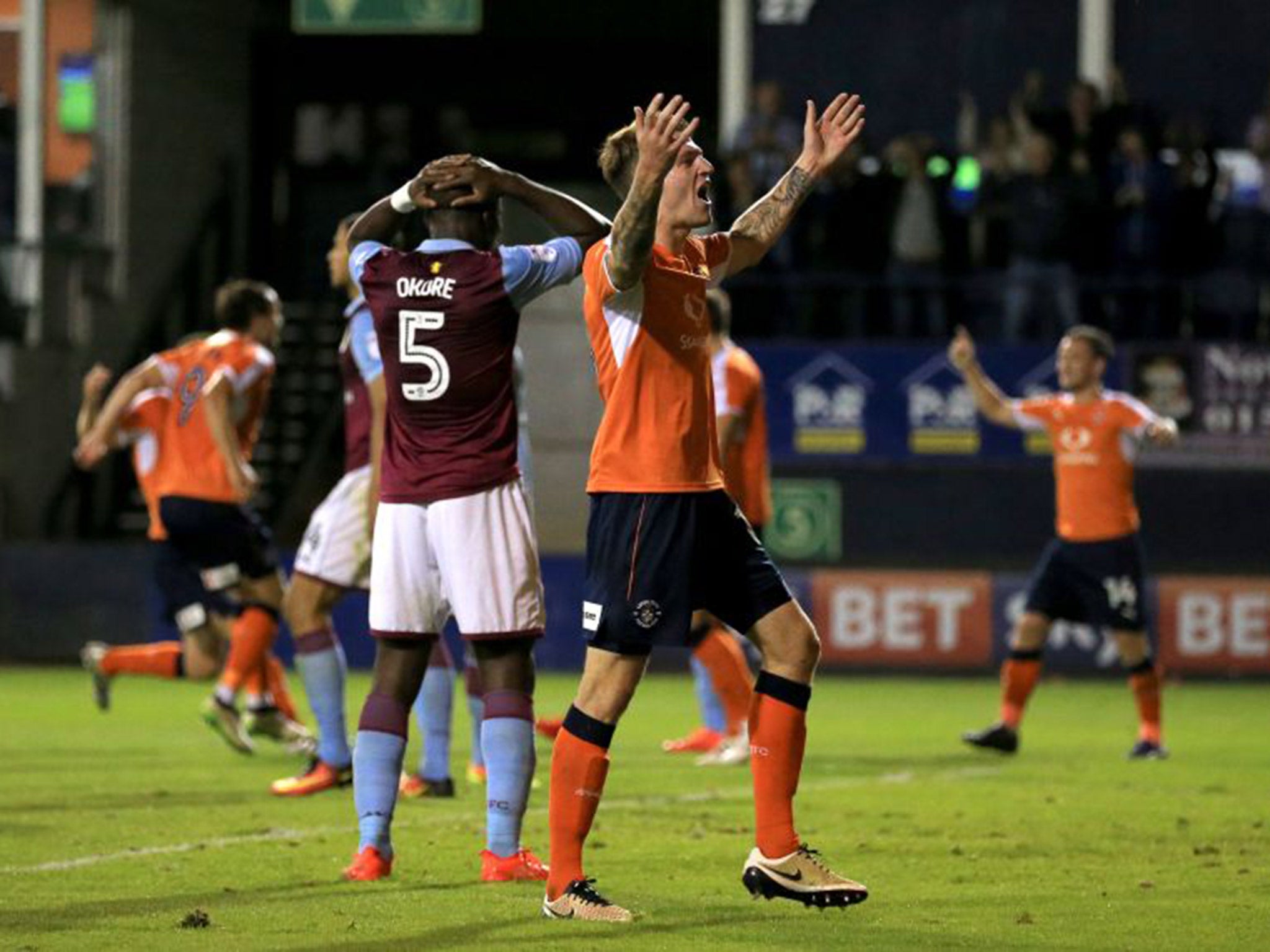 Jores Oroke (left) reacts after scoring an own goal