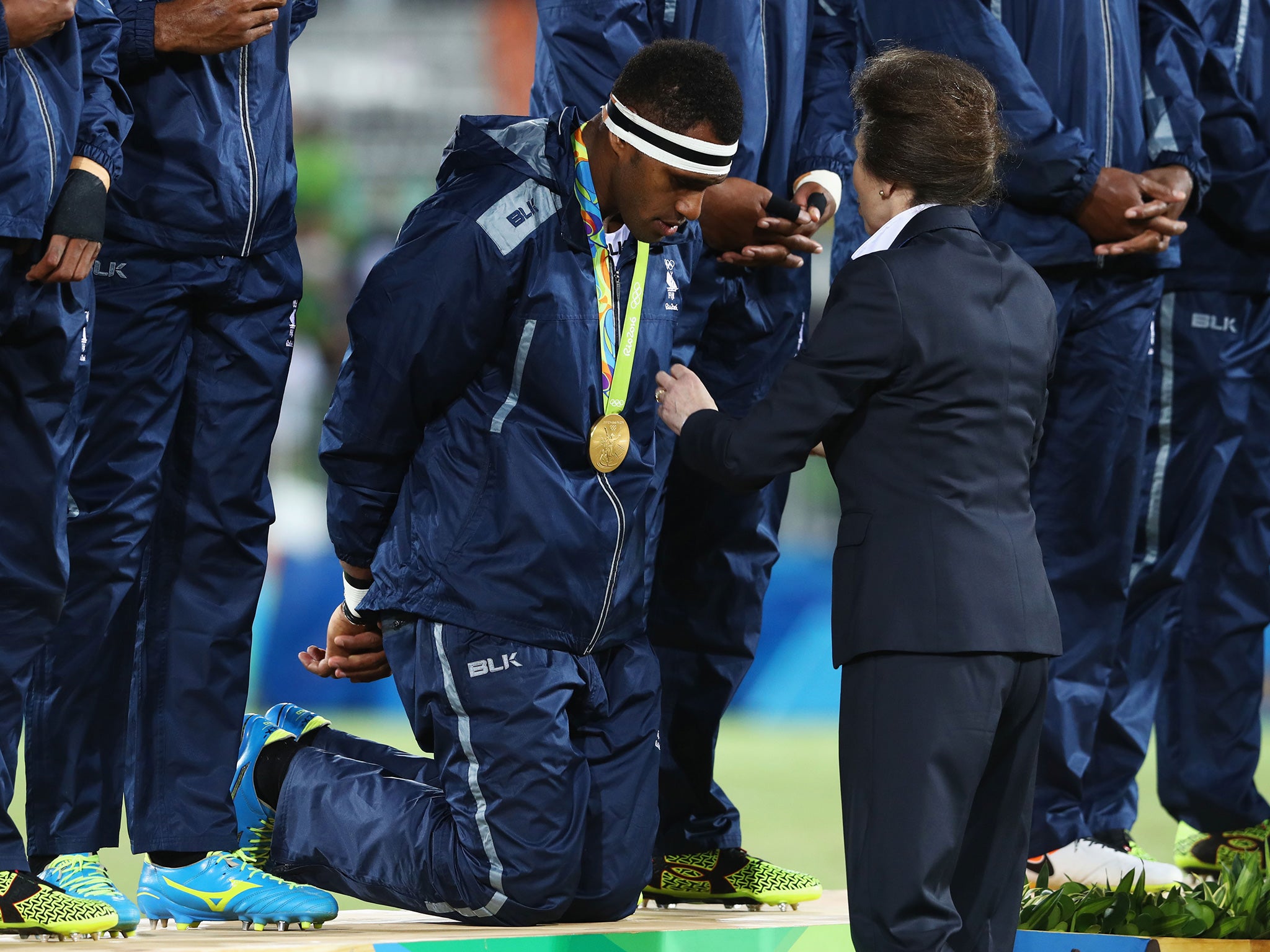 Princess Anne presents the Fiji team with their gold medals