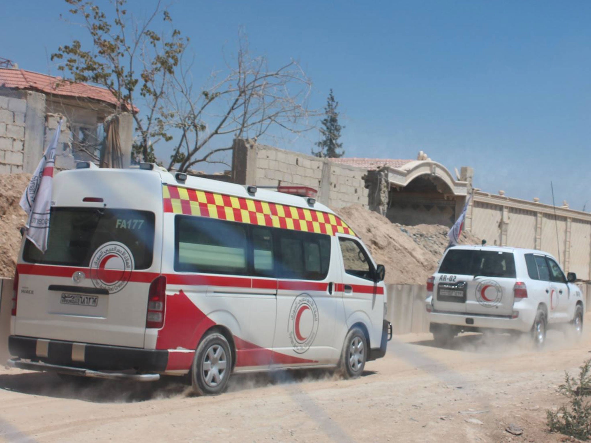 Conjoined twins Moaz and Nawaz being evacuated from Ghouta to Damascus by the Syrian Arab Red Crescent on 12 August