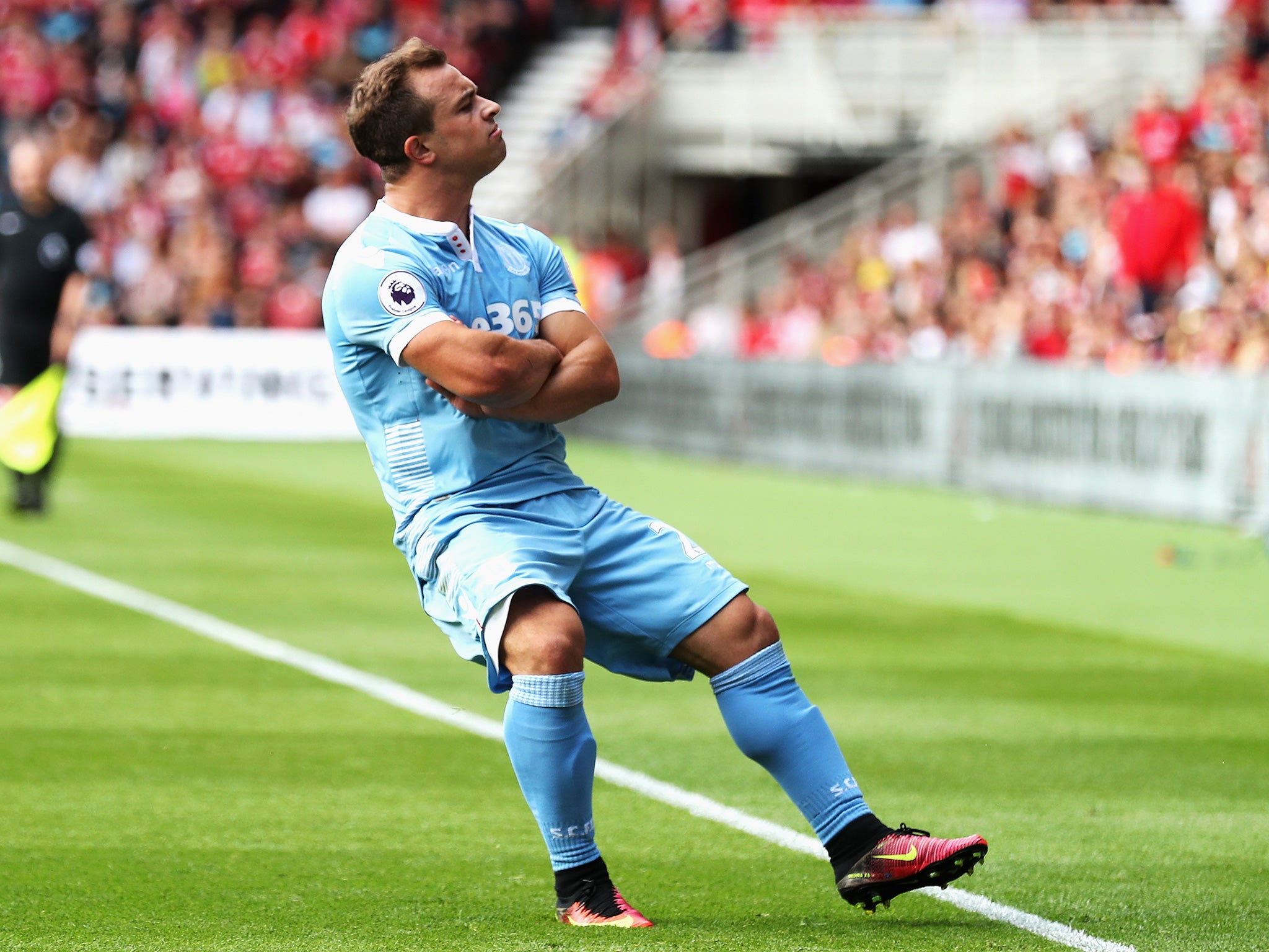 Shaqiri celebrates his equaliser at the Riverside