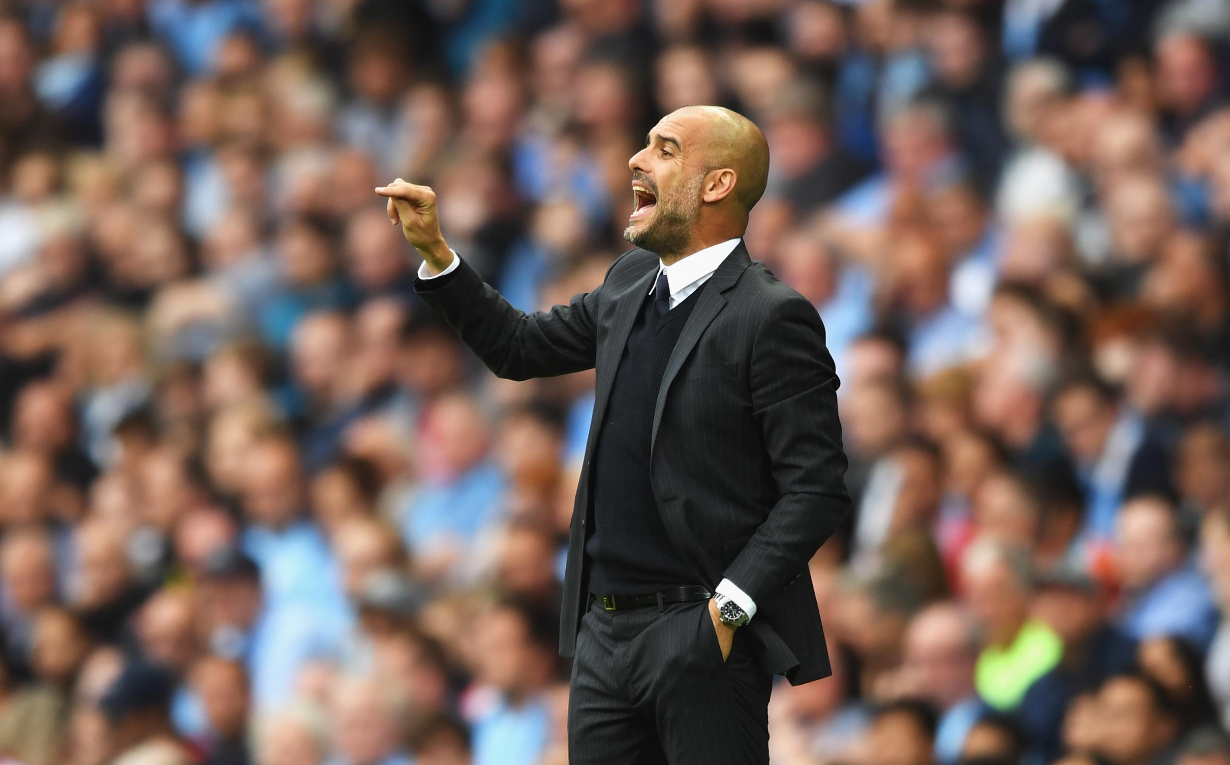 Guardiola pitch-side during City's opener against Sunderland