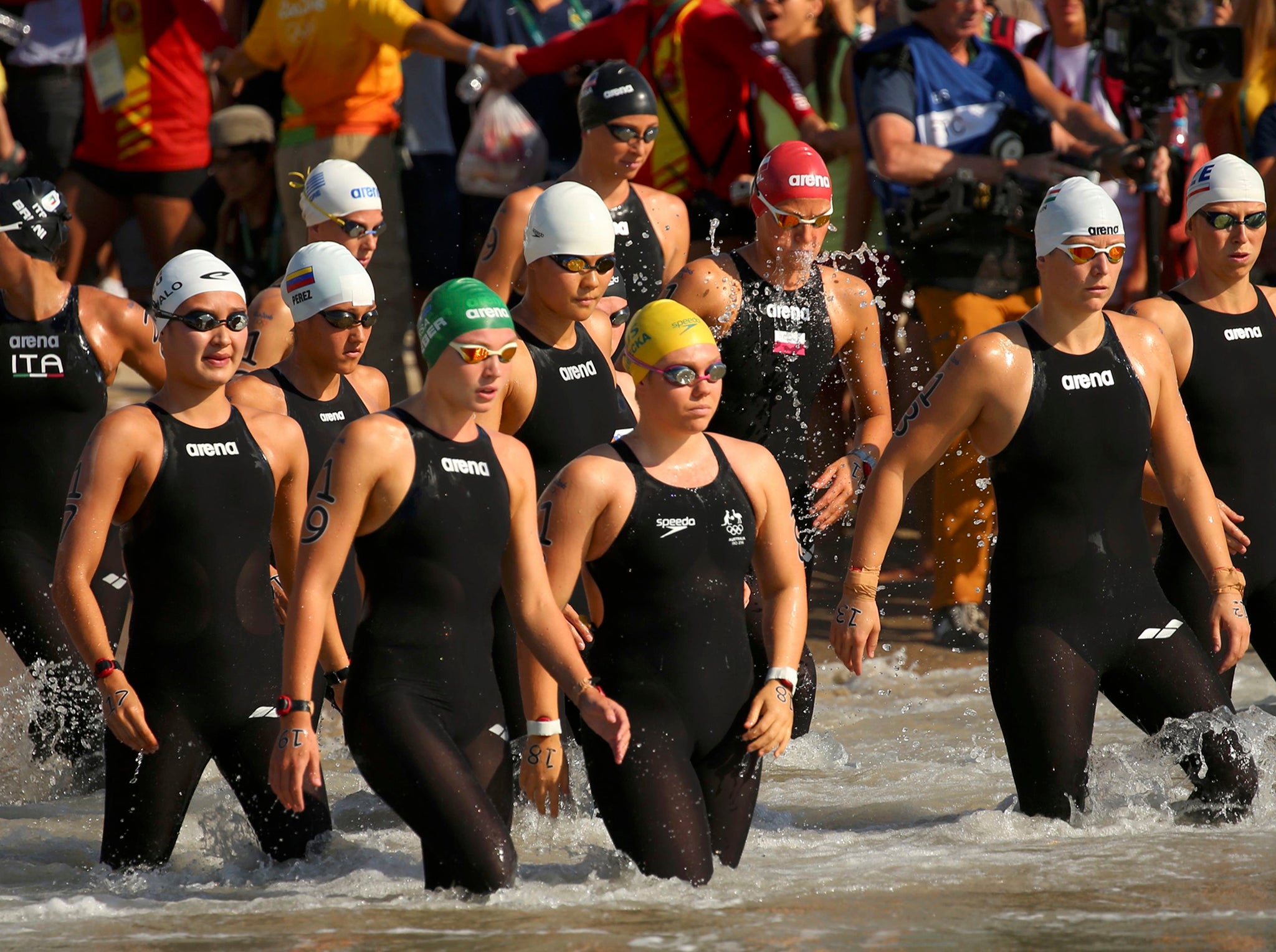 Swimmers were forced to wade out to the start line after the starting platform collapsed and was washed away