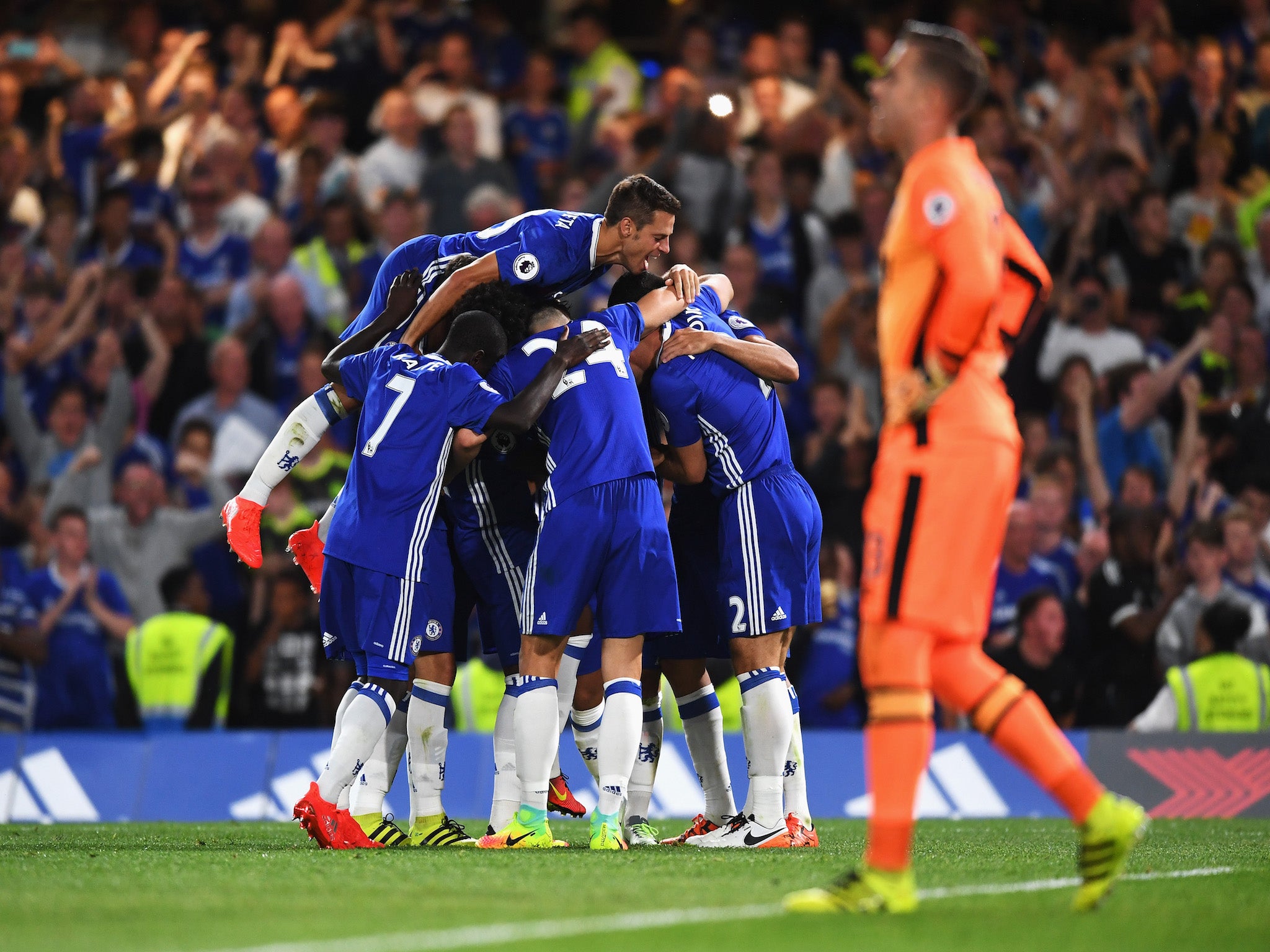 Eden Hazard is congratulated by his team-mates