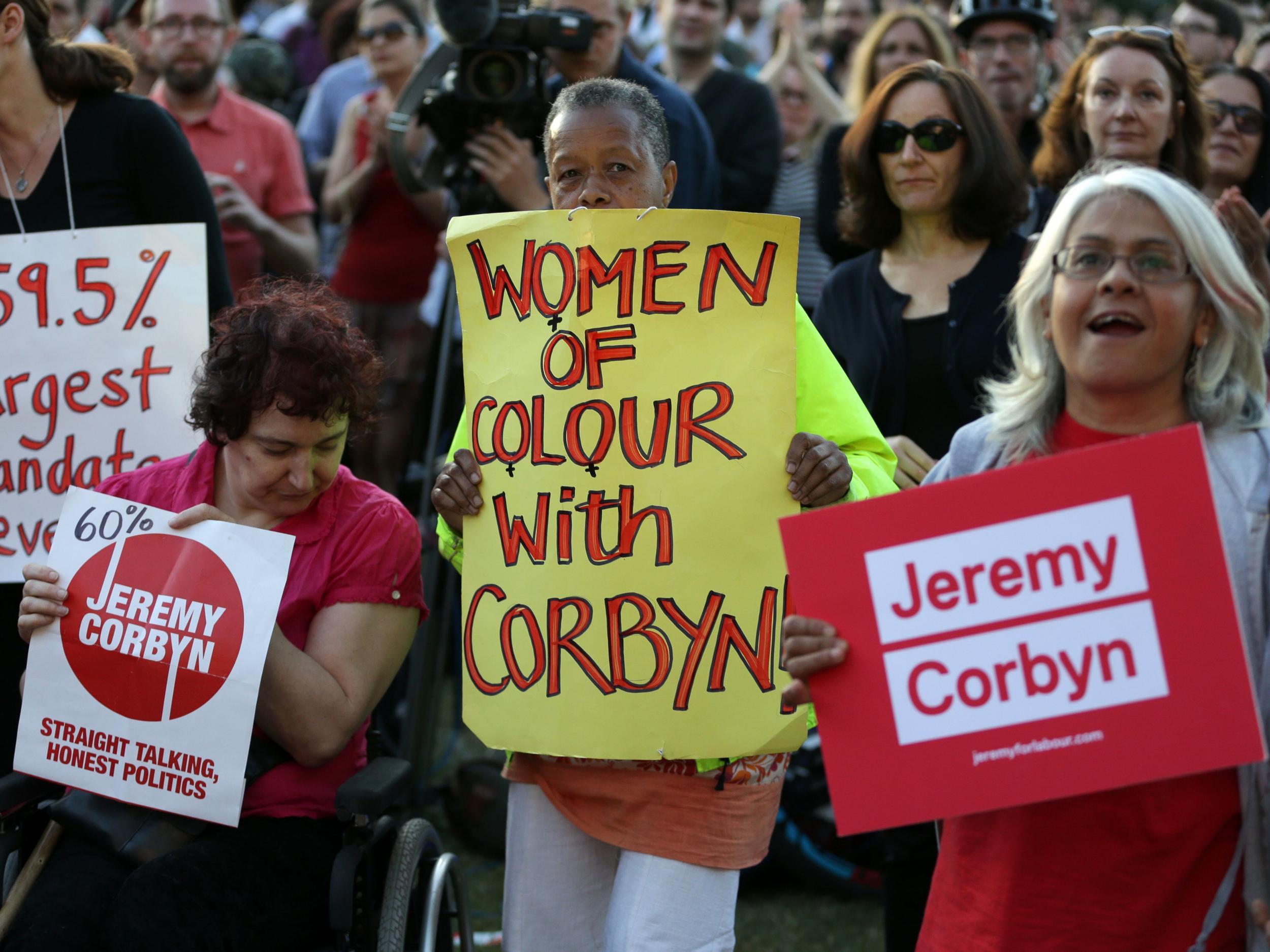 Supporters of Jeremy Corbyn hold up placards and cheer at a Black, Asian and minority ethnic (BAME) rally in north London