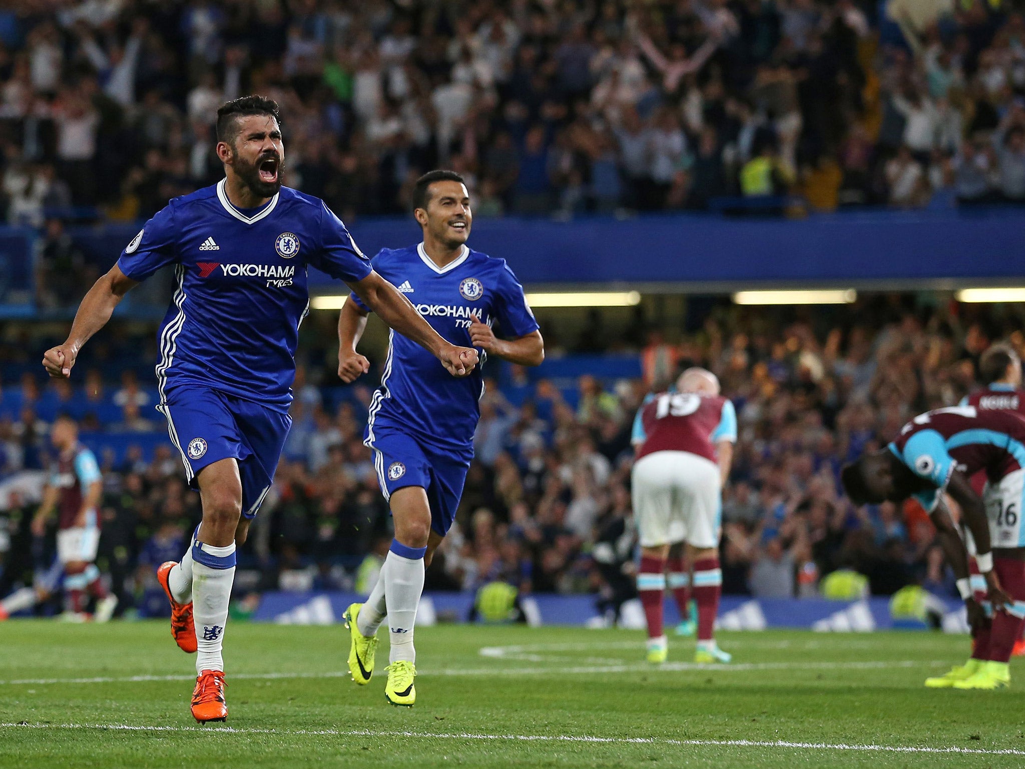 Diego Costa celebrates scoring the winning goal for Chelsea