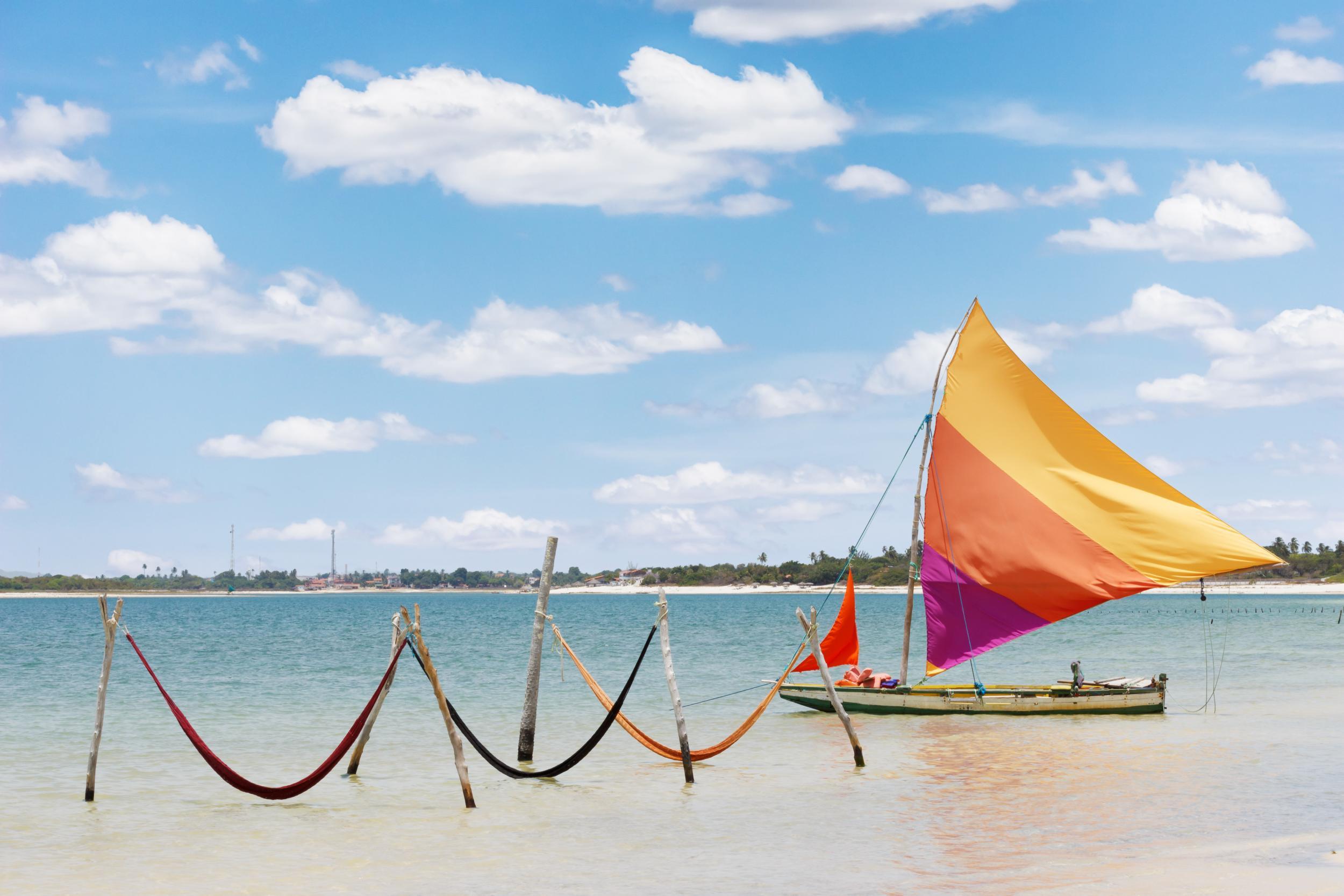 Relax in a hammock in the sea at Brazil's isolated paradise beach, Jericoacoara