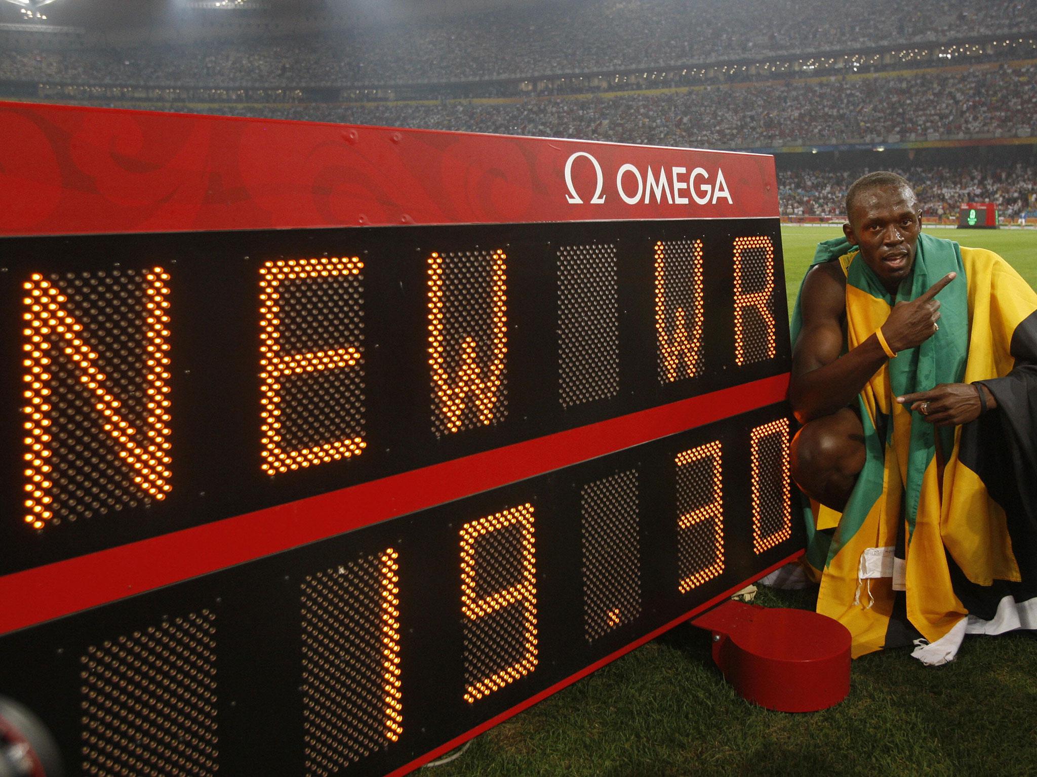Bolt doubles up in China after wining the 200m with a new world record time.