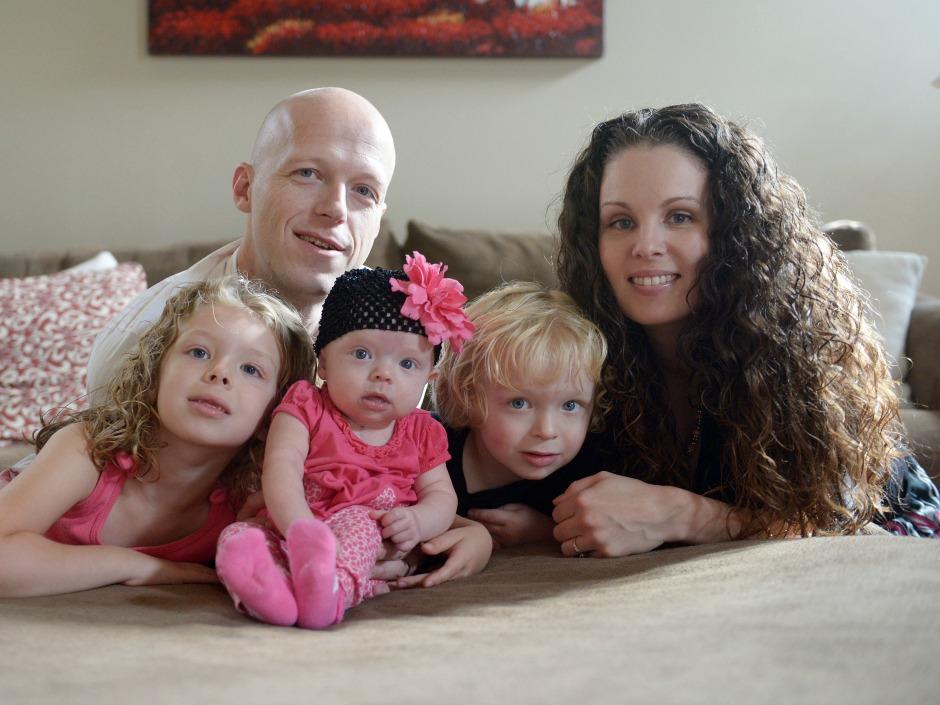 Willow Short, 4-month-old, center, along with her parents Megan and Mark and sister Liana, 6, and brother Mark, 3