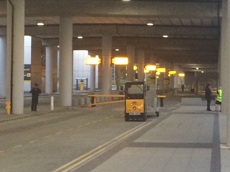 An empty area of Manchester Airport following an evacuation (Aqib Ishtiaq/ Twitter )