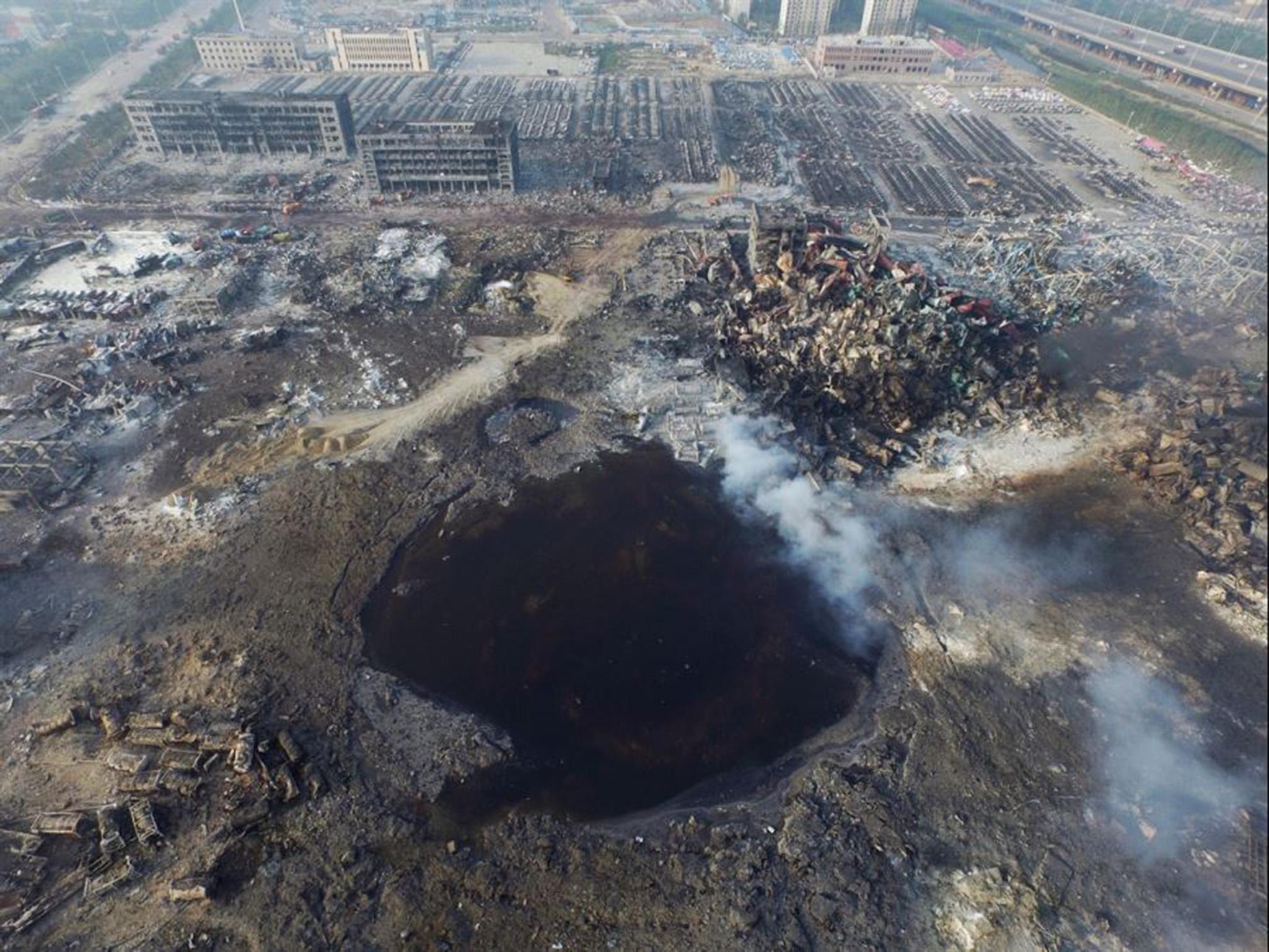 The crater where the factory once stood