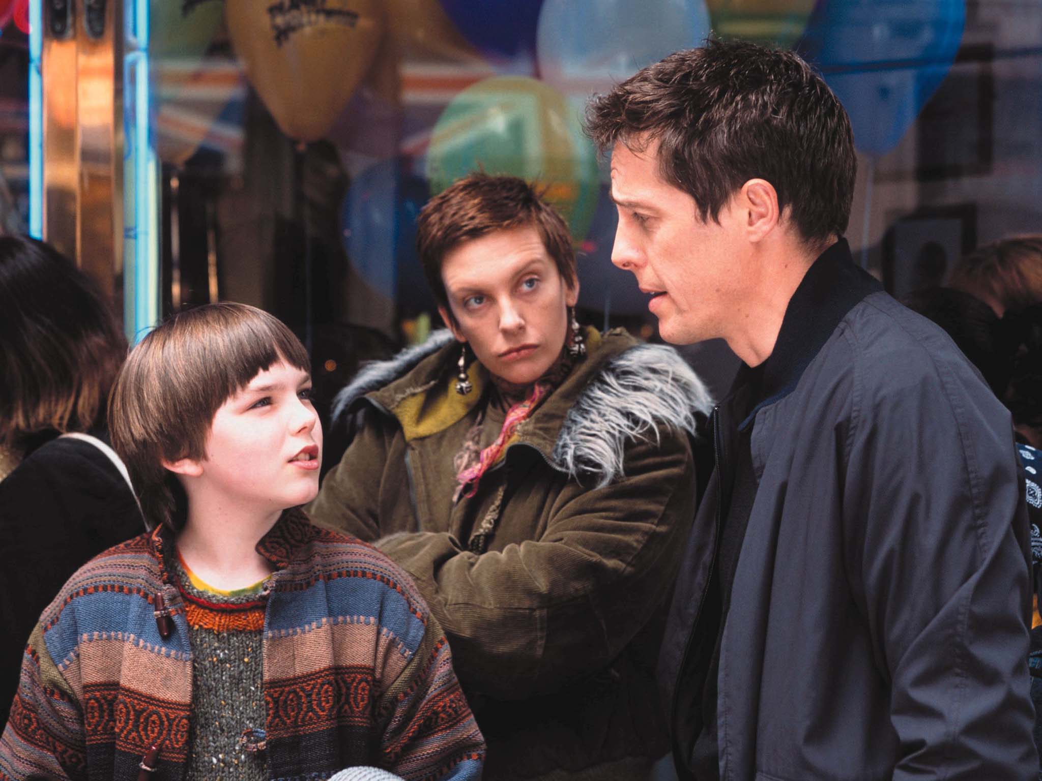 Nicholas Hoult, Hugh Grant and Toni Collette in About a Boy