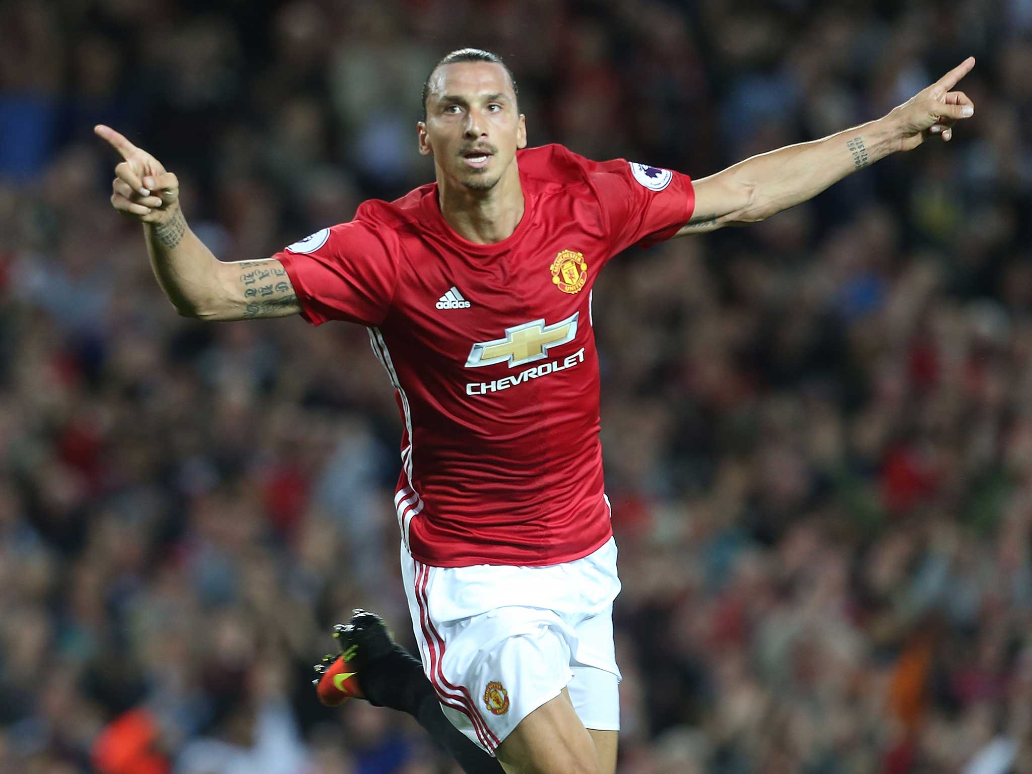 Zlatan Ibrahimovic celebrates scoring his first goal at Old Trafford