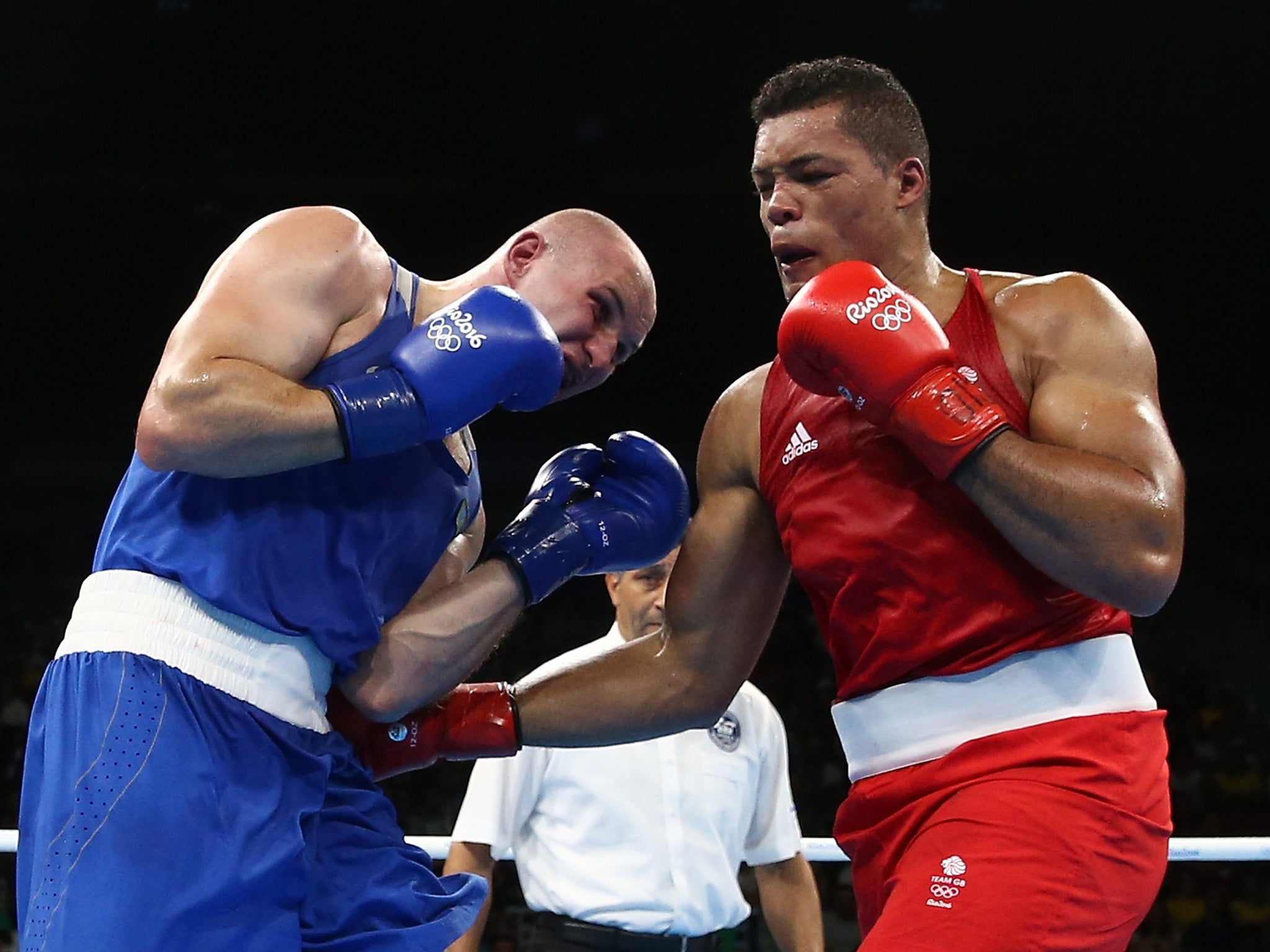 Joyce, right, recovered from losing the first round to beat Dychko