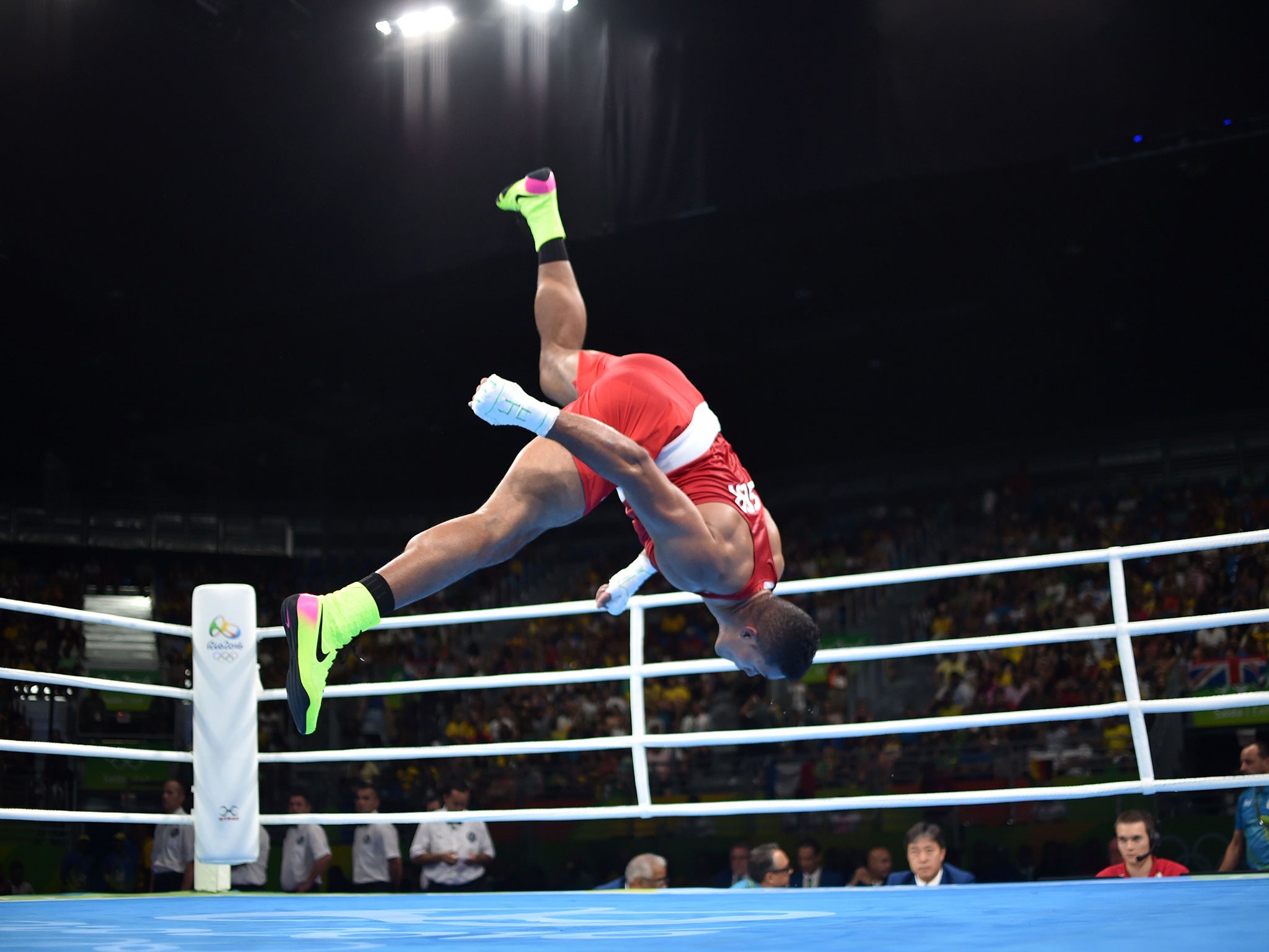 Joyce performs the Brazilian martial art capoeira after his victory