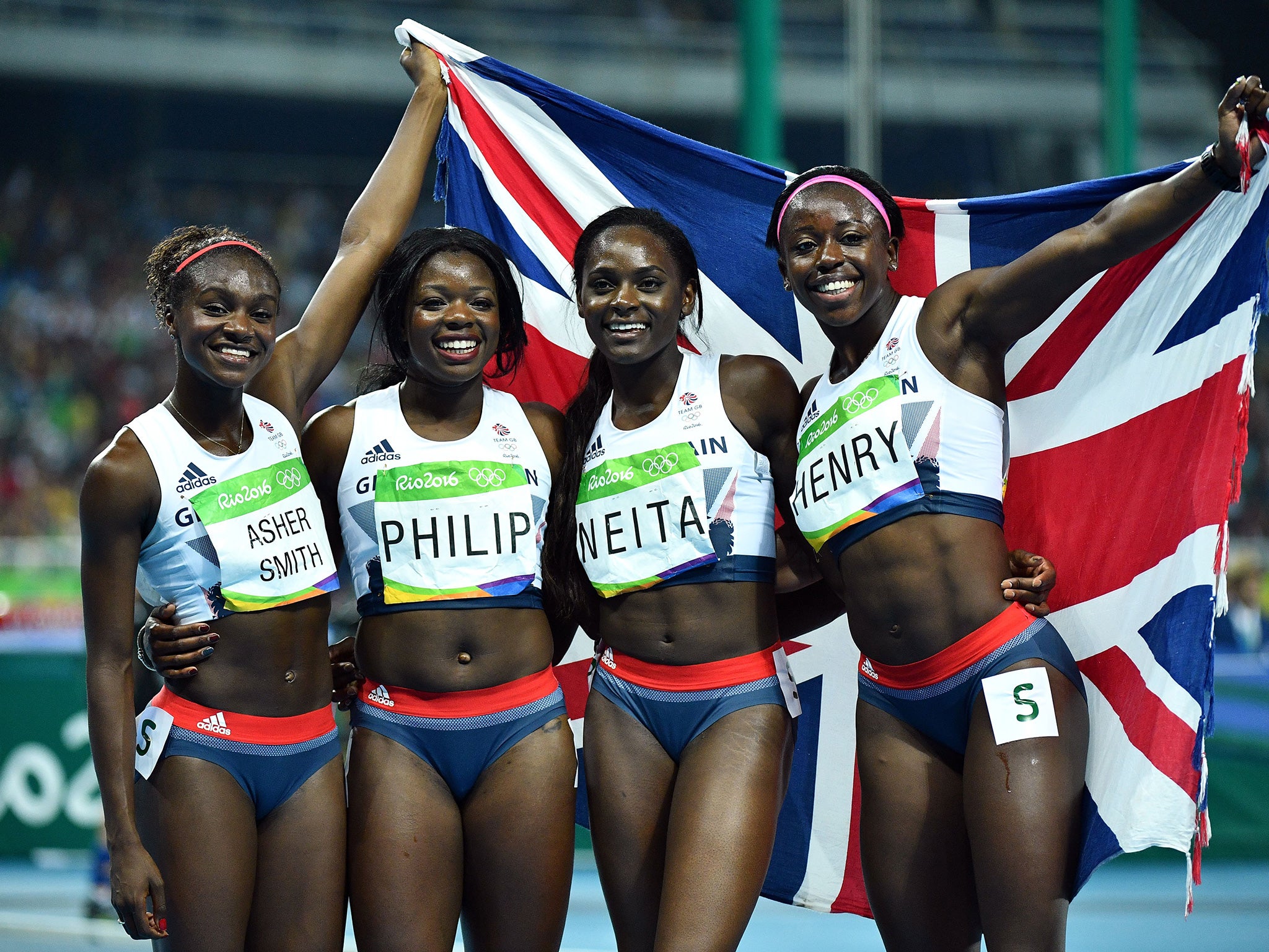 Great Britain's Dina Asher-Smith, Asha Philip, Daryll Neita and Desiree Henry celebrate taking bronze