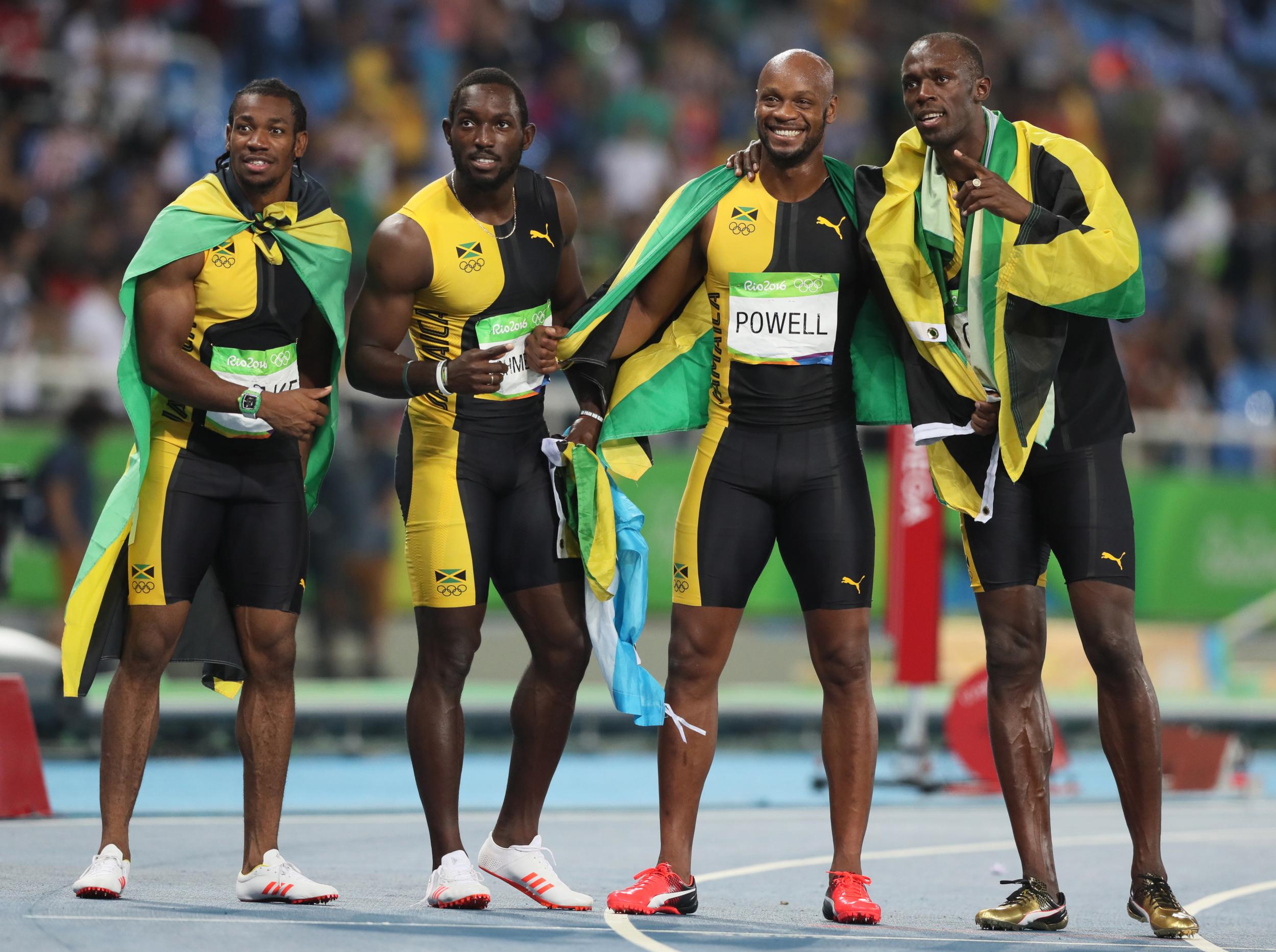 Jamaica's Yohan Blake, Nickel Ashmeade, Asafa Powell and Usain Bolt celebrate winning gold in the Men's 4x100m relay final