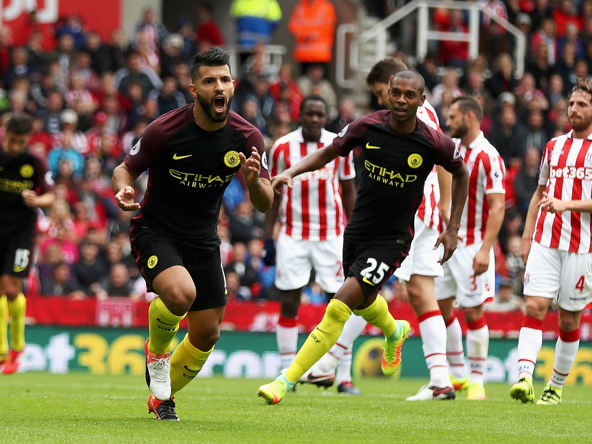 Aguero pulls away after scoring his penalty