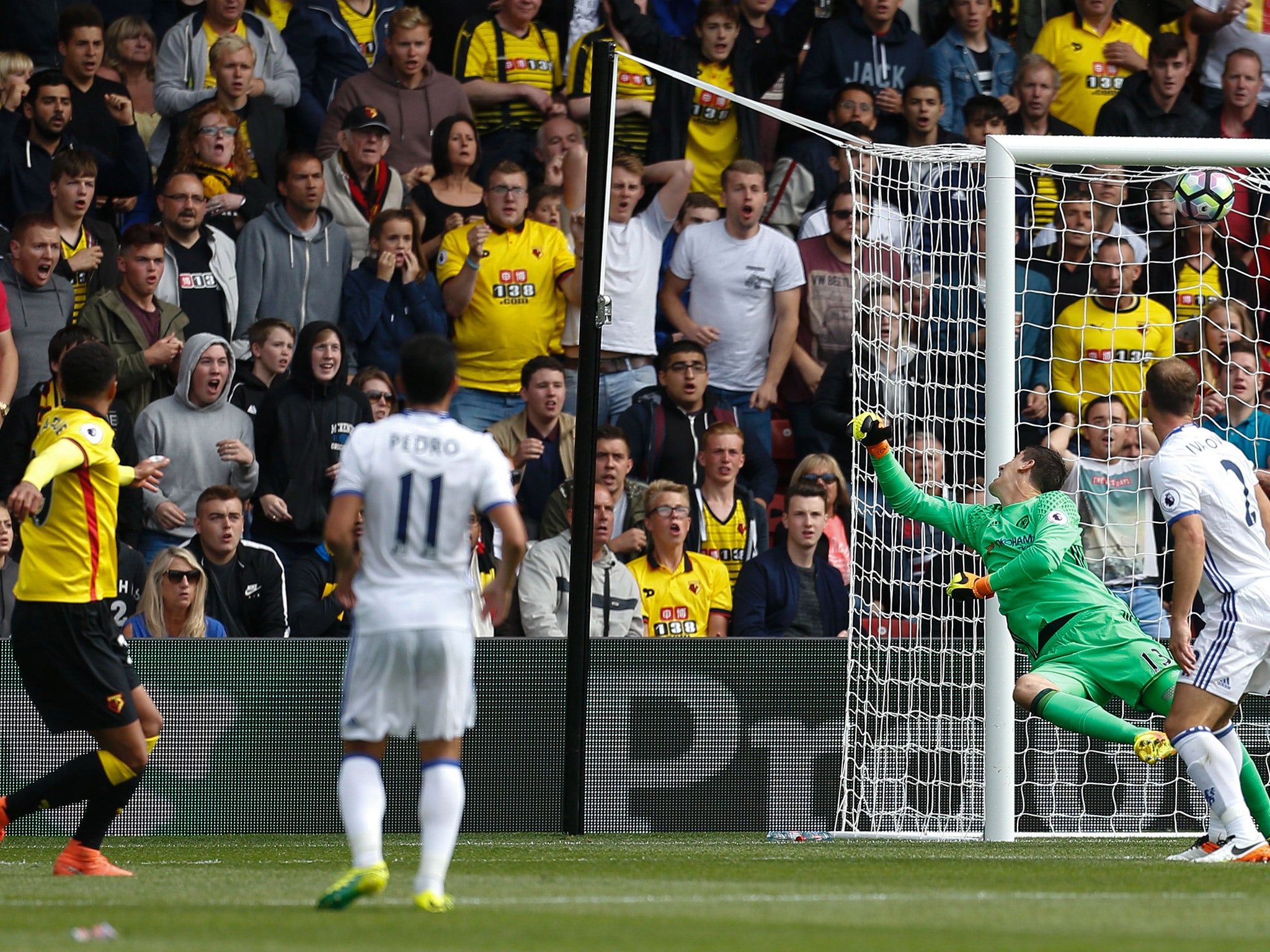 Etienne Capoue fires the ball past Thibaut Courtois to open the scoring