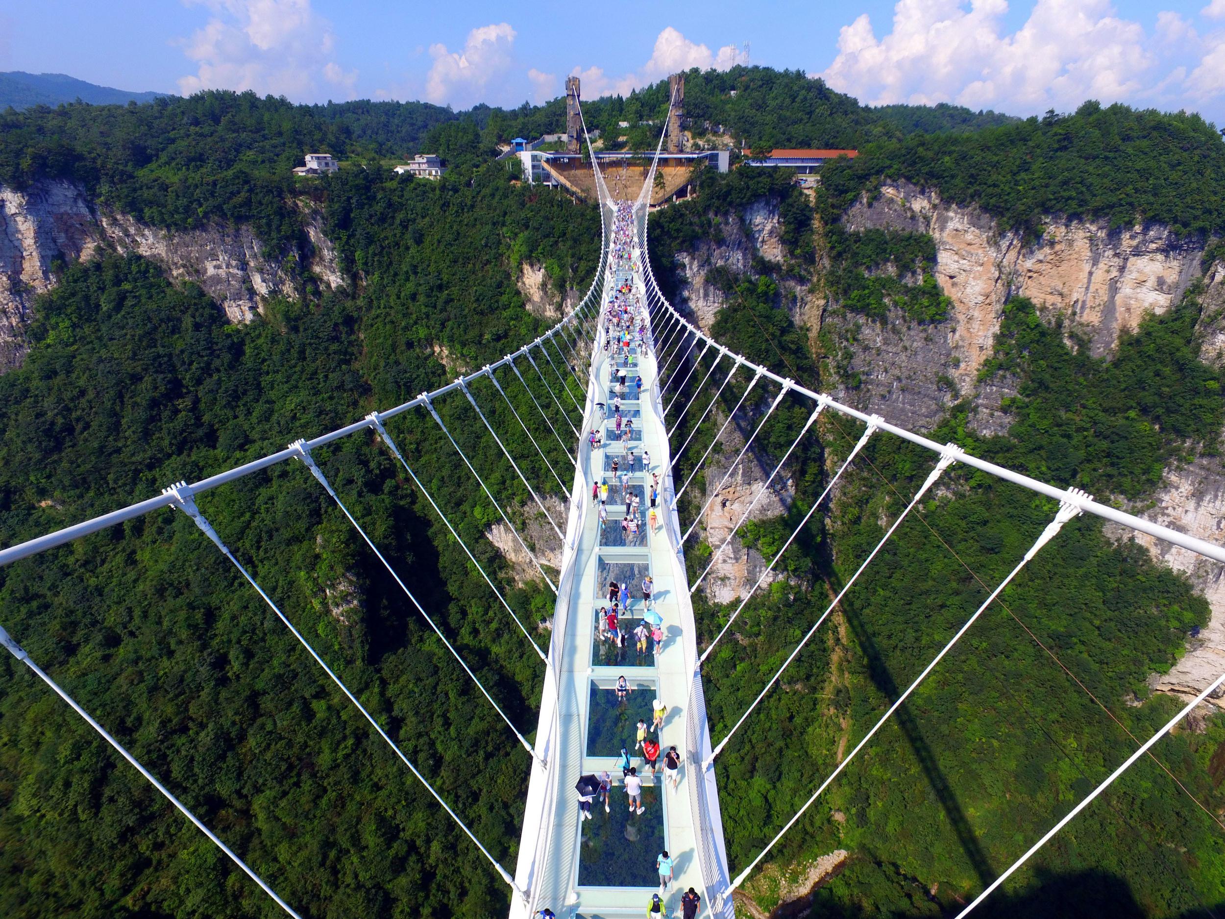 Visitors can peer into the depths of a valley 300m below through a transparent floor