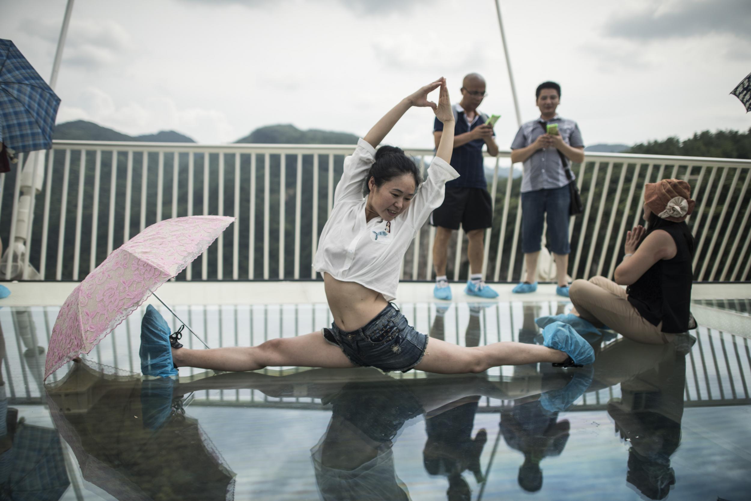 One woman posed doing the splits