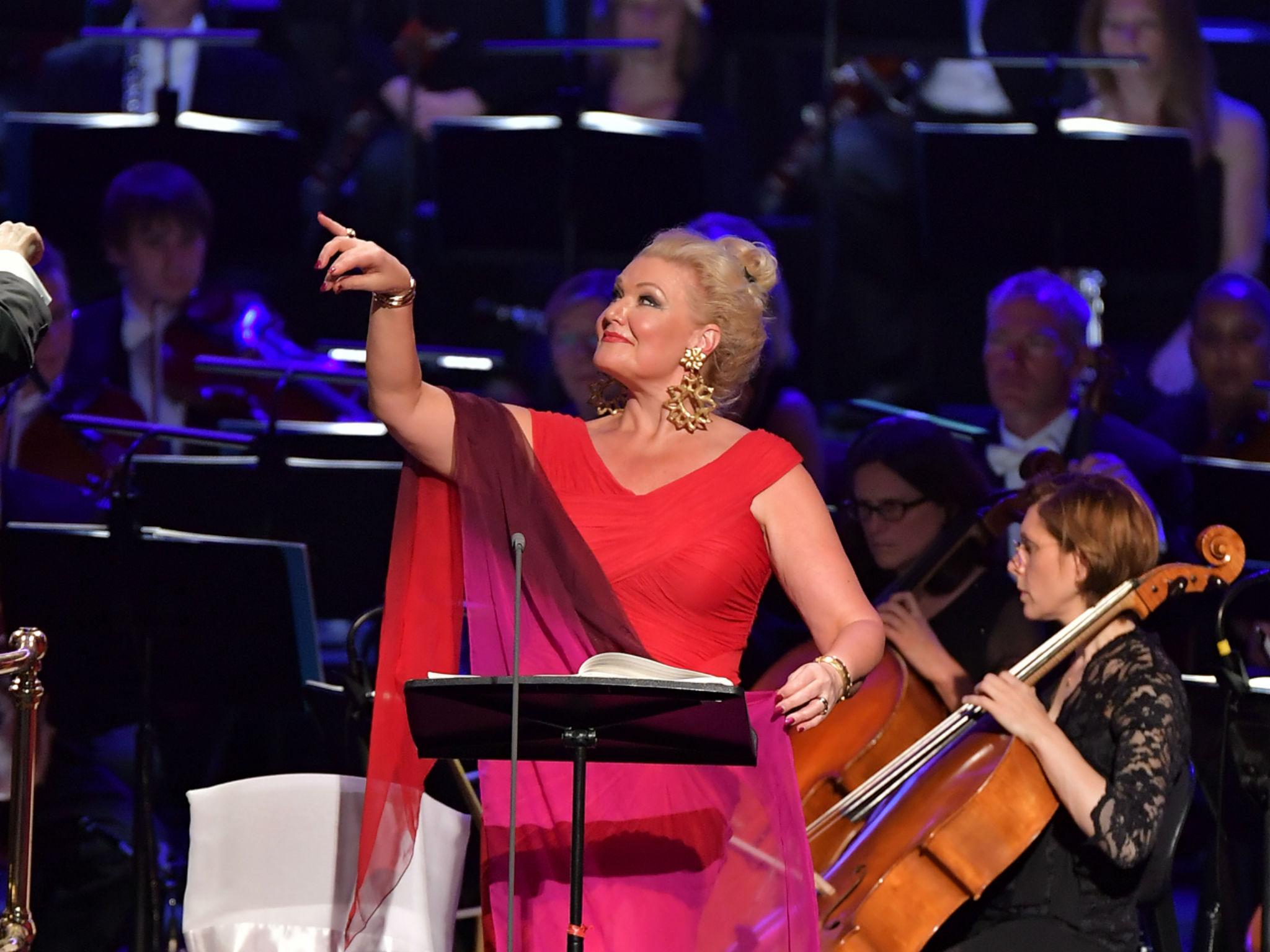 Soprano Karita Mattila bounds through a range of emotions, resplendent in red