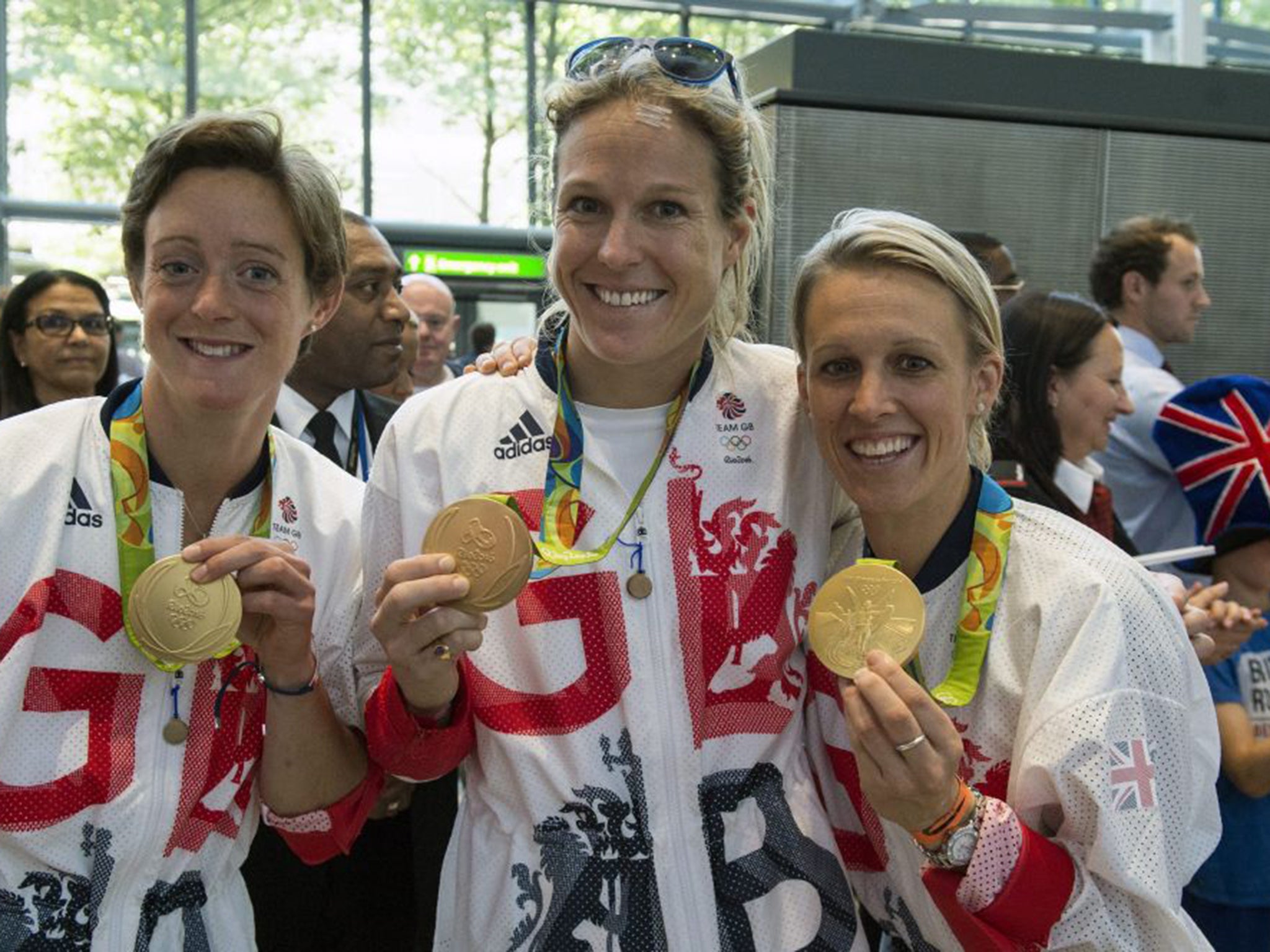 Hockey players Hannah Macleod (left), Crista Cullen (centre) and Alex Danson at Heathrow yesterday