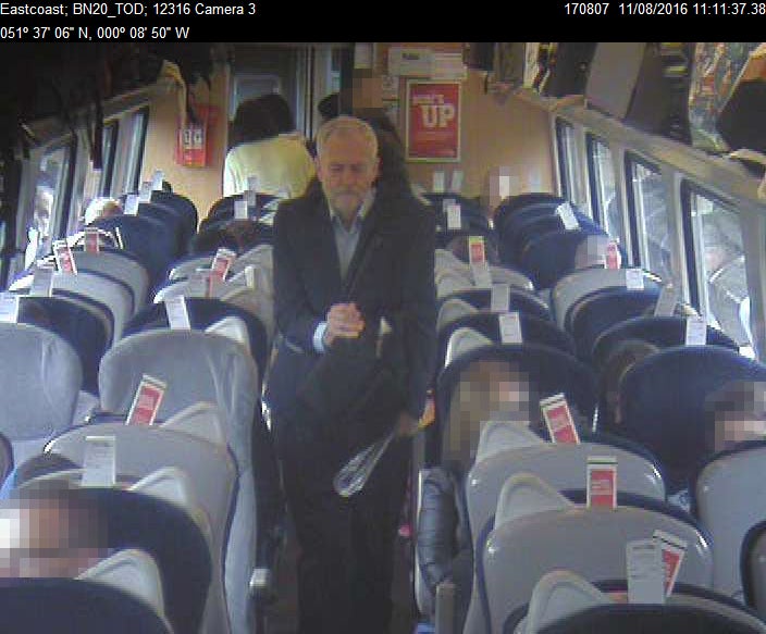 11:11am: Mr Corbyn passes through carriage F full of empty seats with reserved tickets