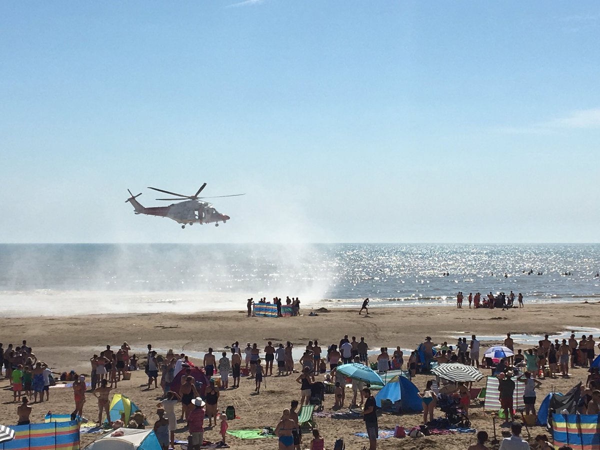 Camber Sands, near Rye, East Sussex shortly after three people pulled from sea