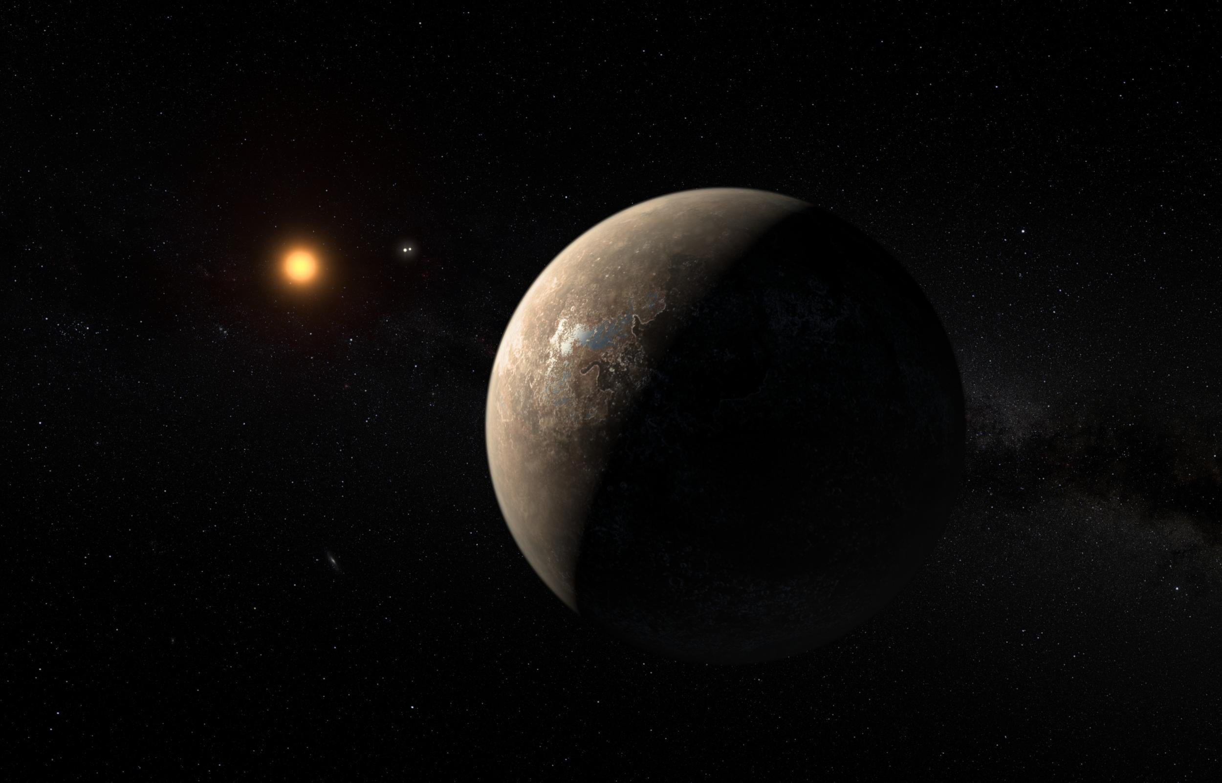 This artist’s impression shows the planet Proxima b orbiting the red dwarf star Proxima Centauri, the closest star to the Solar System. The double star Alpha Centauri AB also appears in the image between the planet and Proxima itself.