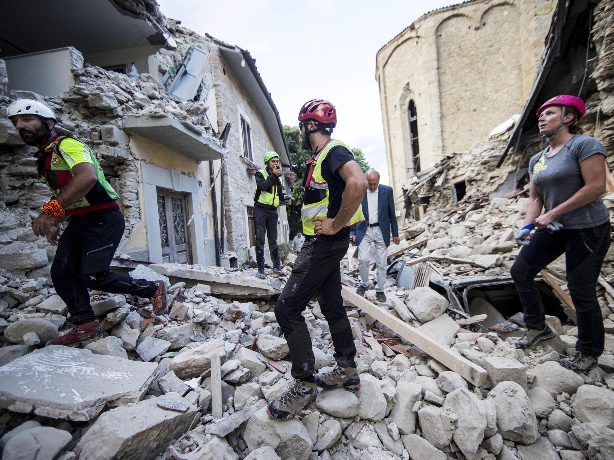 Volounteers work in Amatrice, central Italy where a earthquake struck just after 3:30 a.m