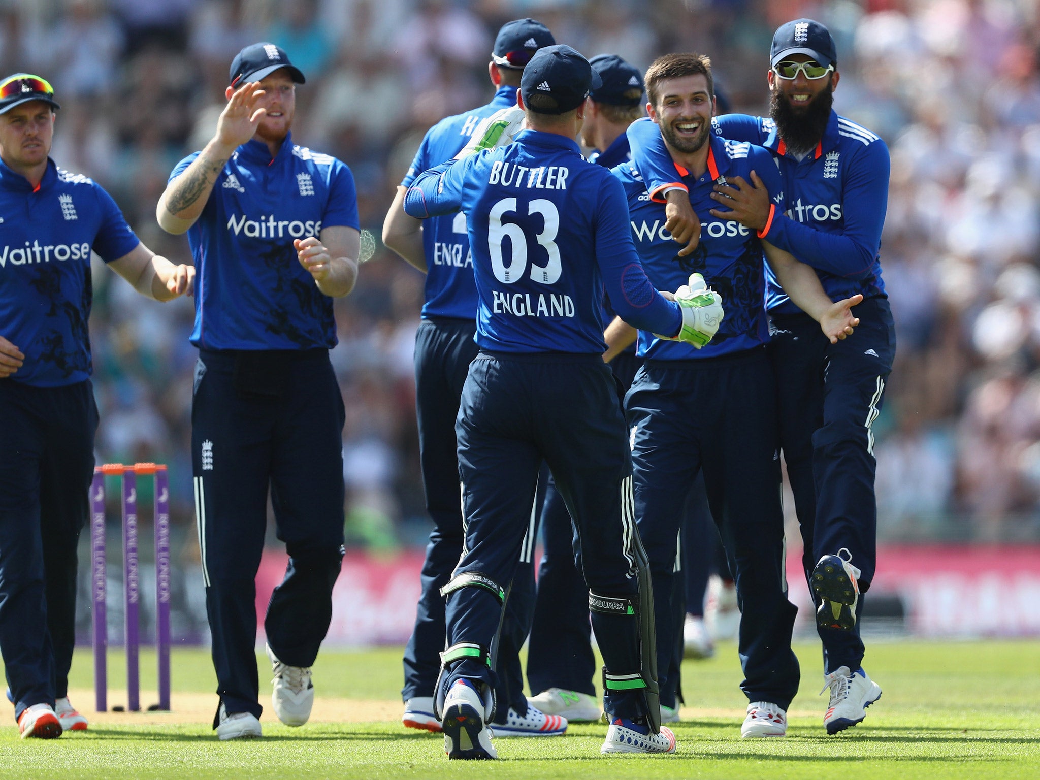 England celebrate after Mark Wood took the wicket of Pakistan batsman Sharjeel Khan