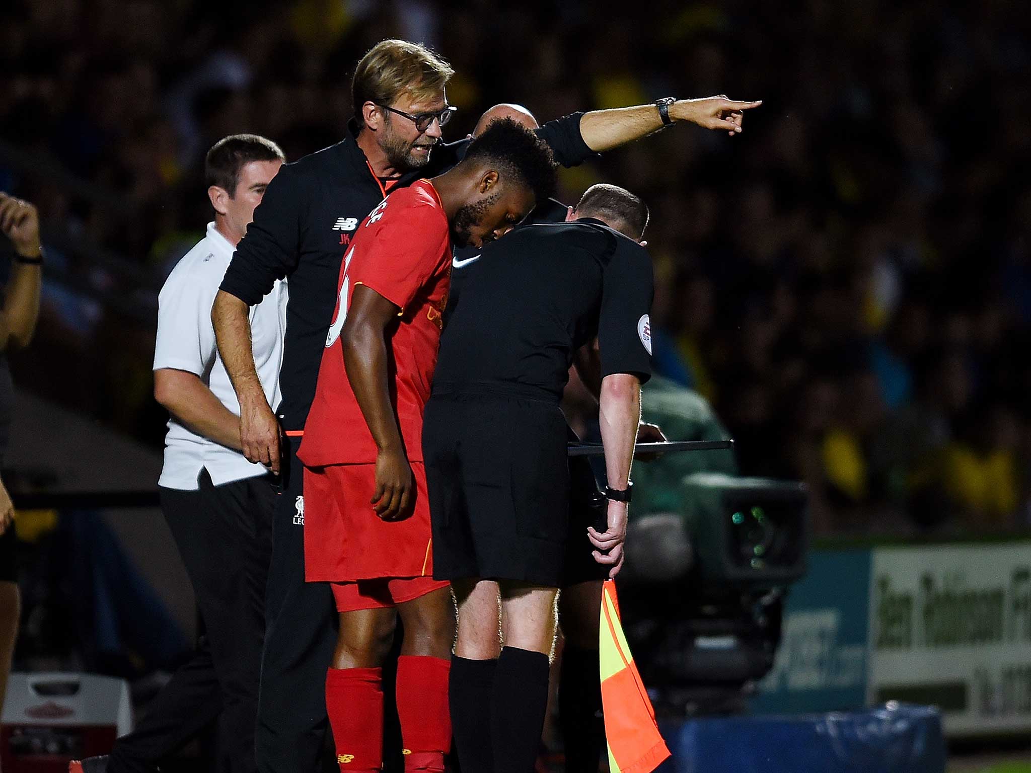 Jurgen Klopp gives Daniel Sturridge instructions during the win at Burton