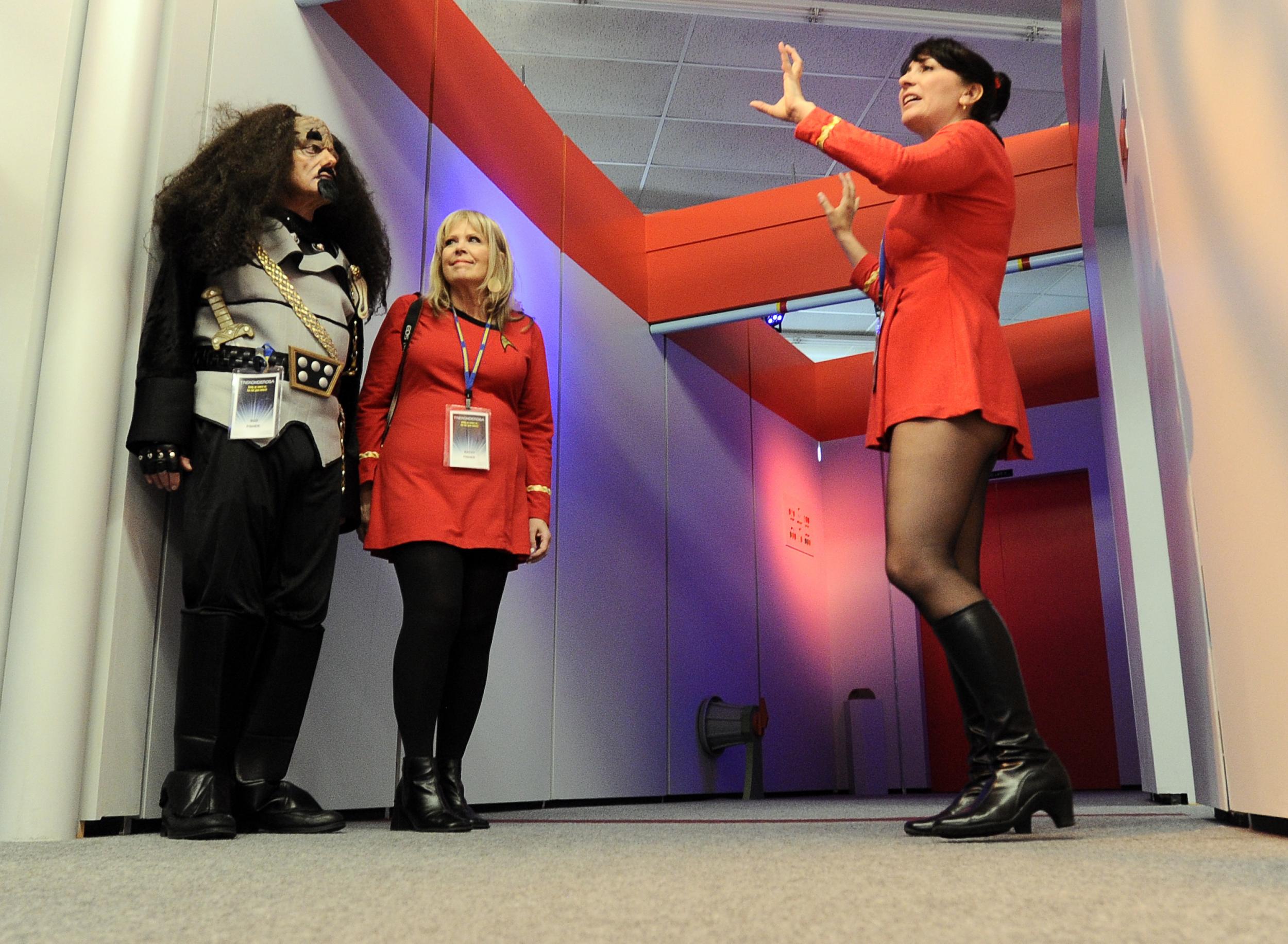 Bud Fisher, left, and his wife Kathy Fisher came prepared for their guided tour of the replica Starship Enterprise