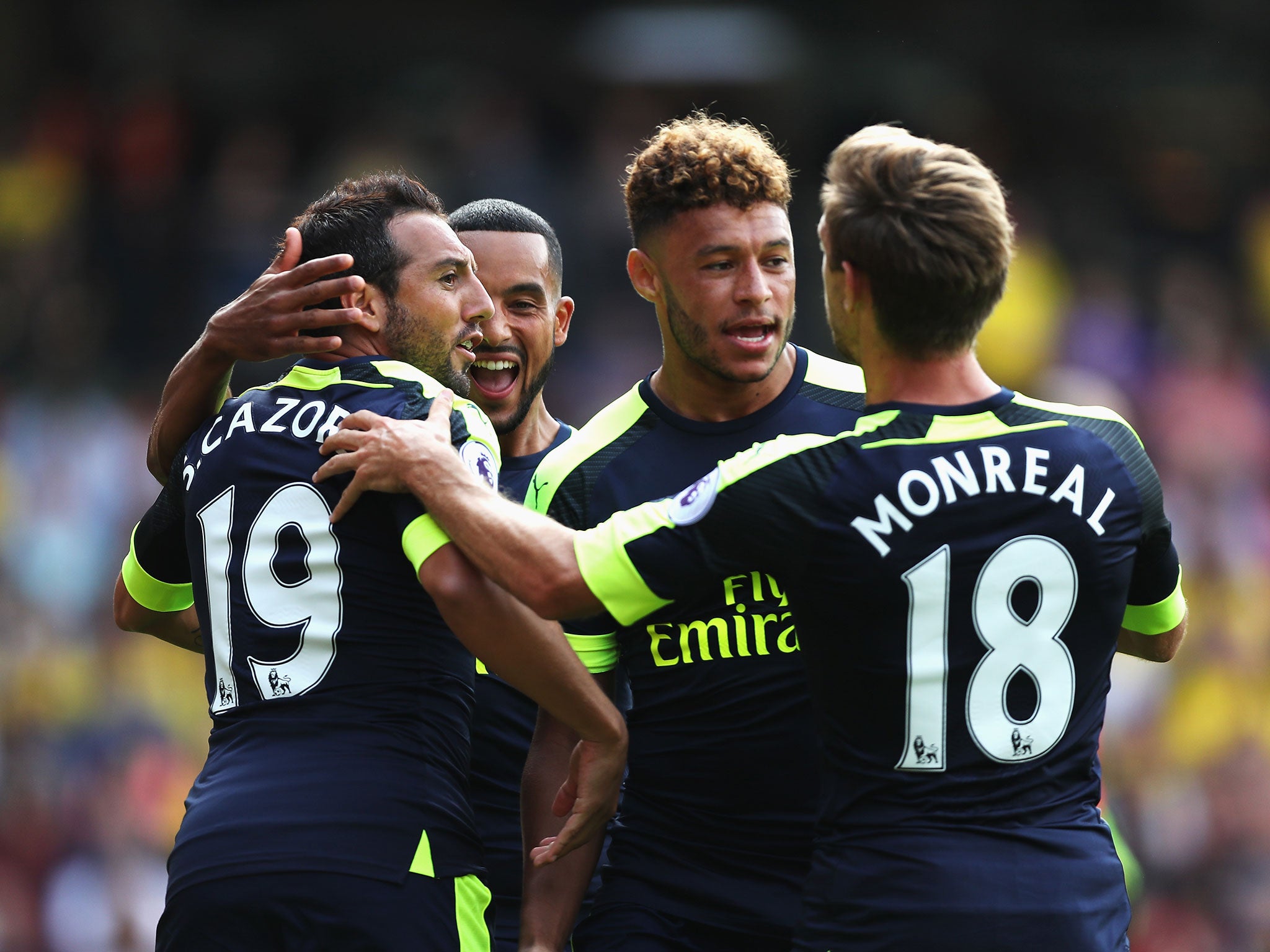 Arsenal's players celebrate following Santi Cazorla's goal