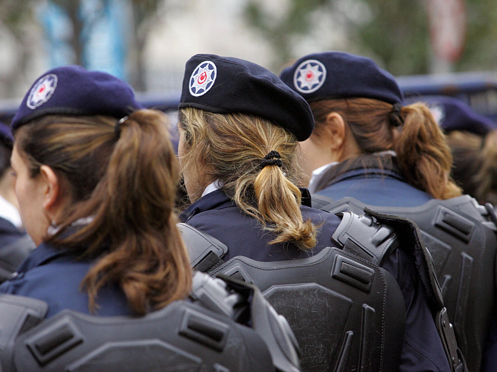 Turkish policewomen stand guard at the entrance of the the Holy Spirit Cathedral in Istanbul