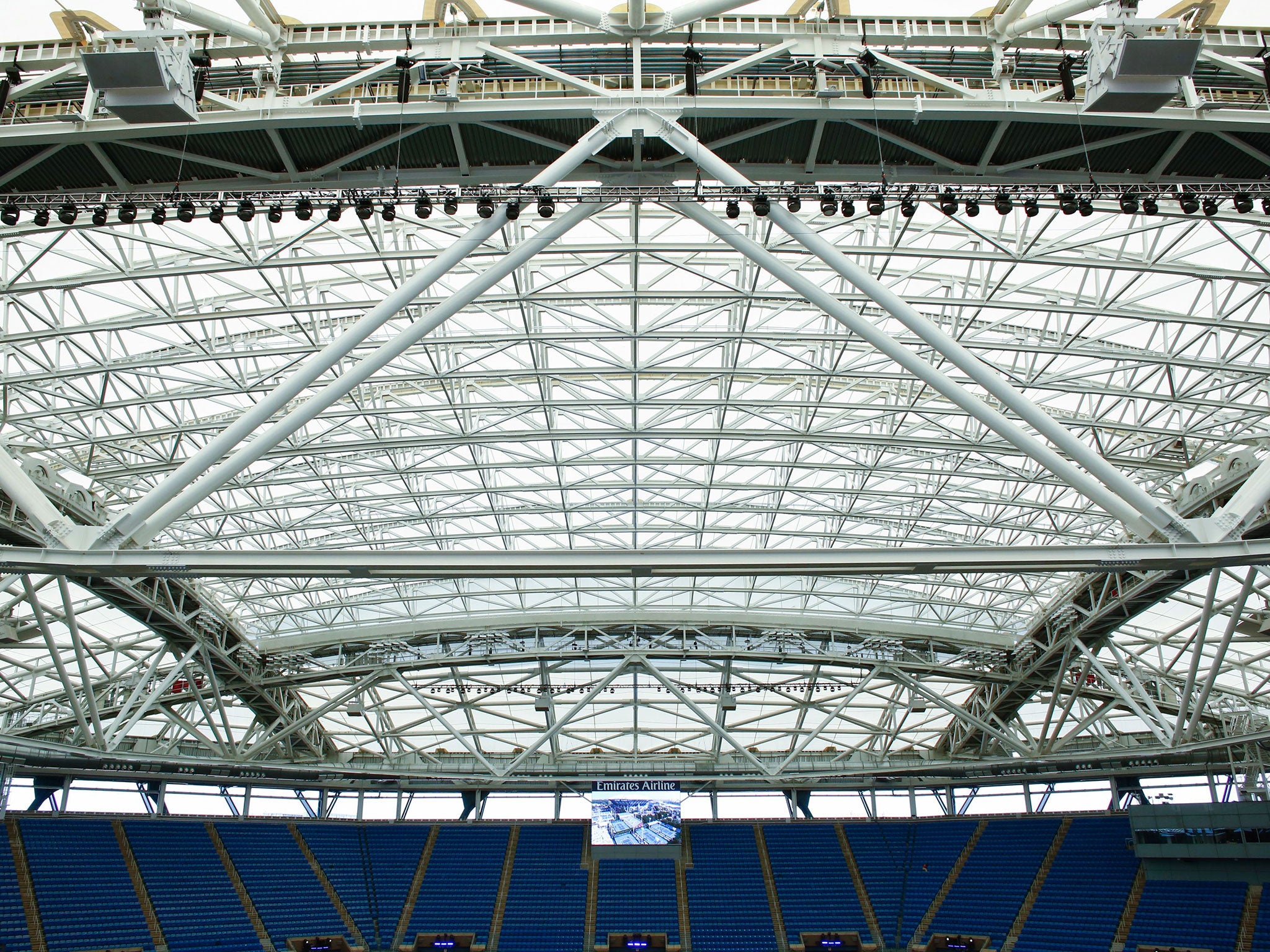 The retractable roof in action - part of a $550m redevelopment of Flushing Meadow