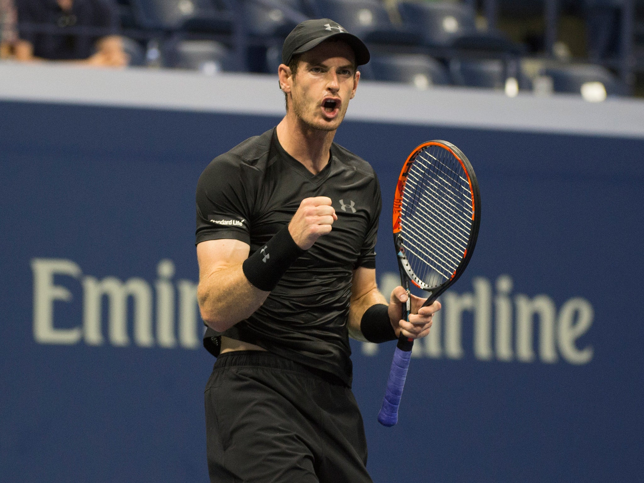 Murray celebrates after defeating Rosol in straight sets