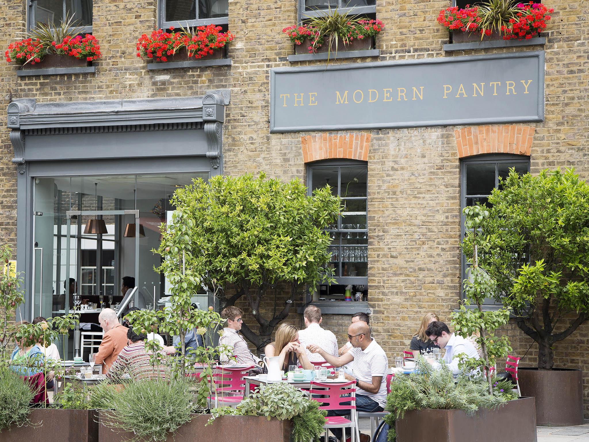 The seating terrace in St John’s Square at the front of the renovated warehouse