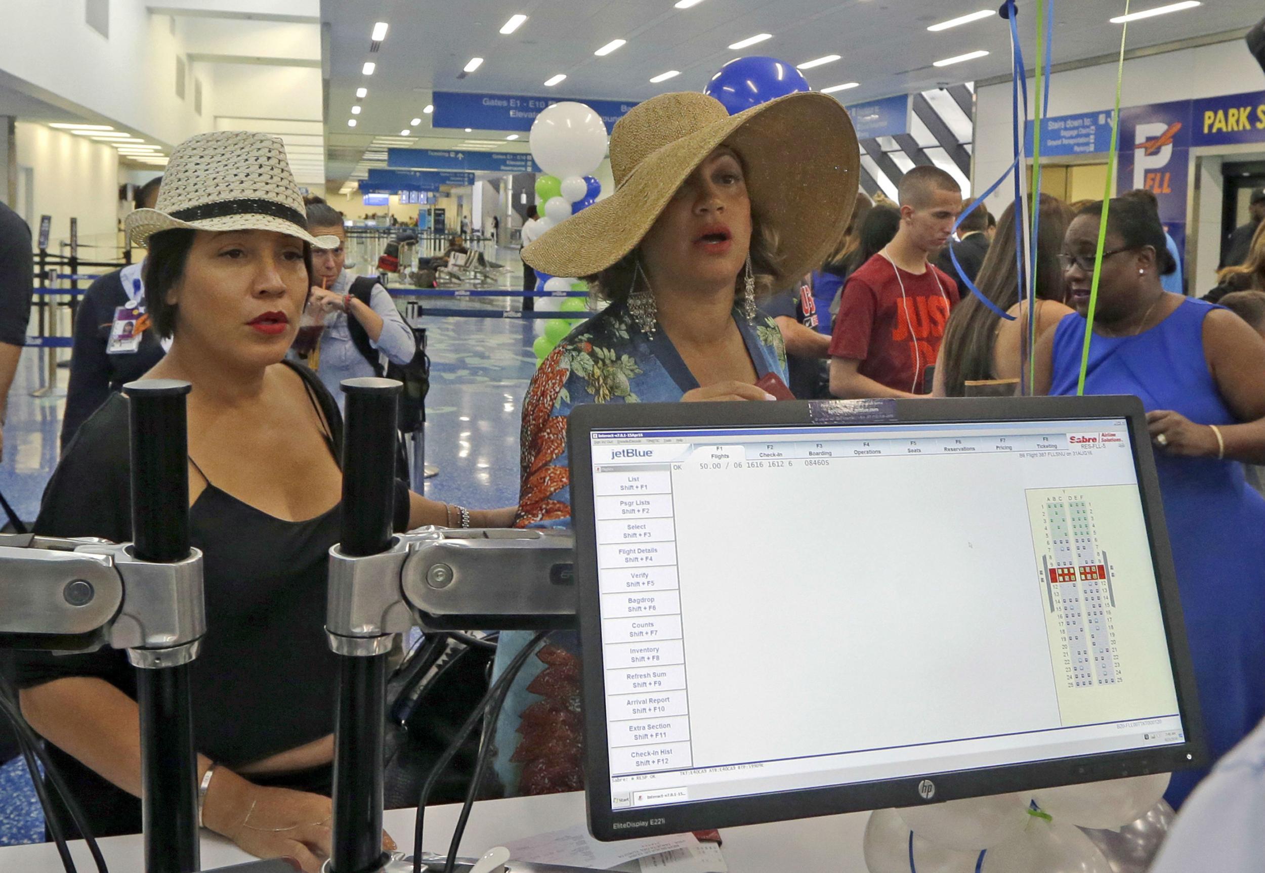 Passengers preparing to board JetBlue flight to Santa Clara on Wednesday