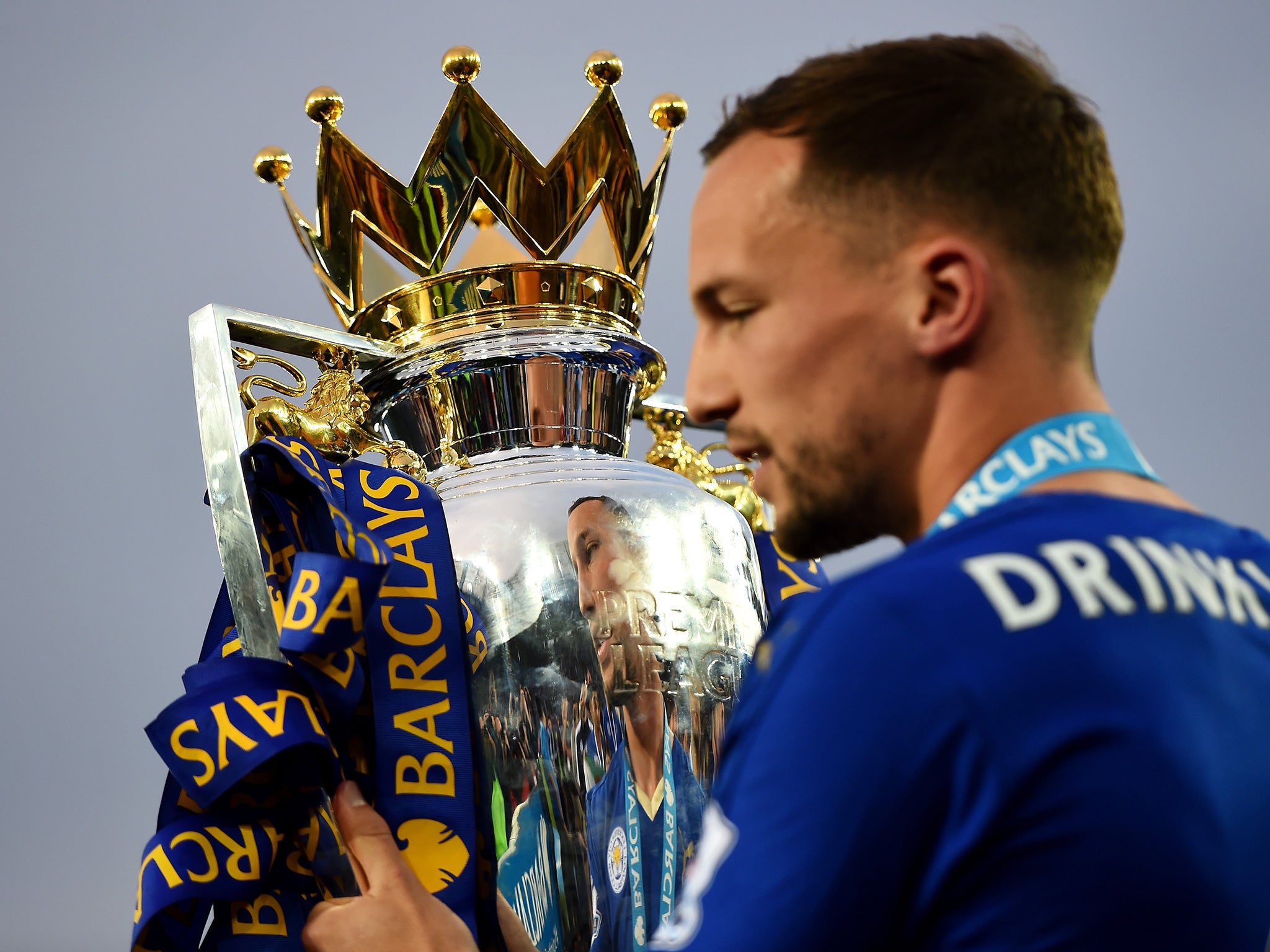 Drinkwater celebrates with the Premier League trophy