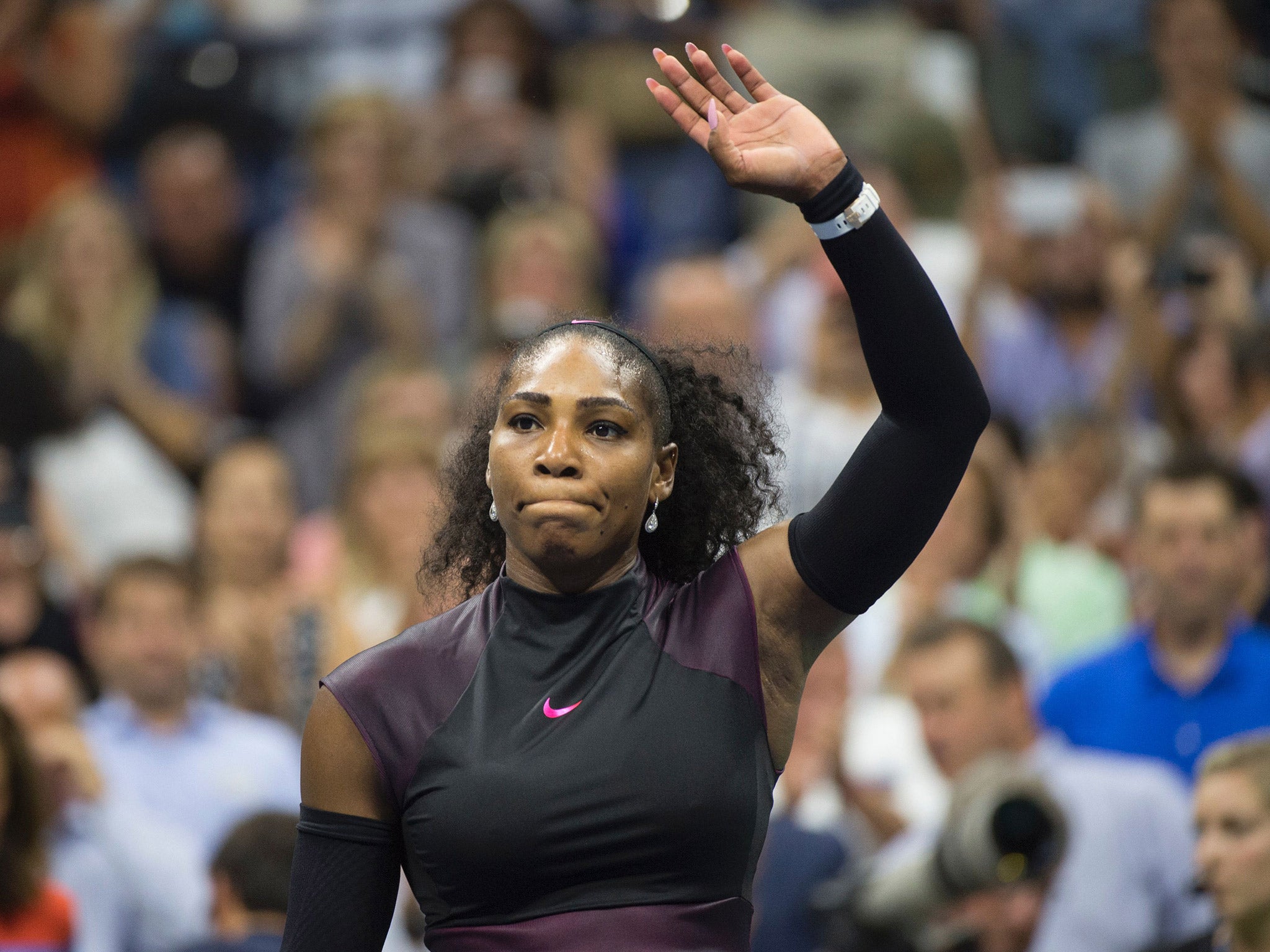 Serena Williams waves to her fans after defeating Vania King