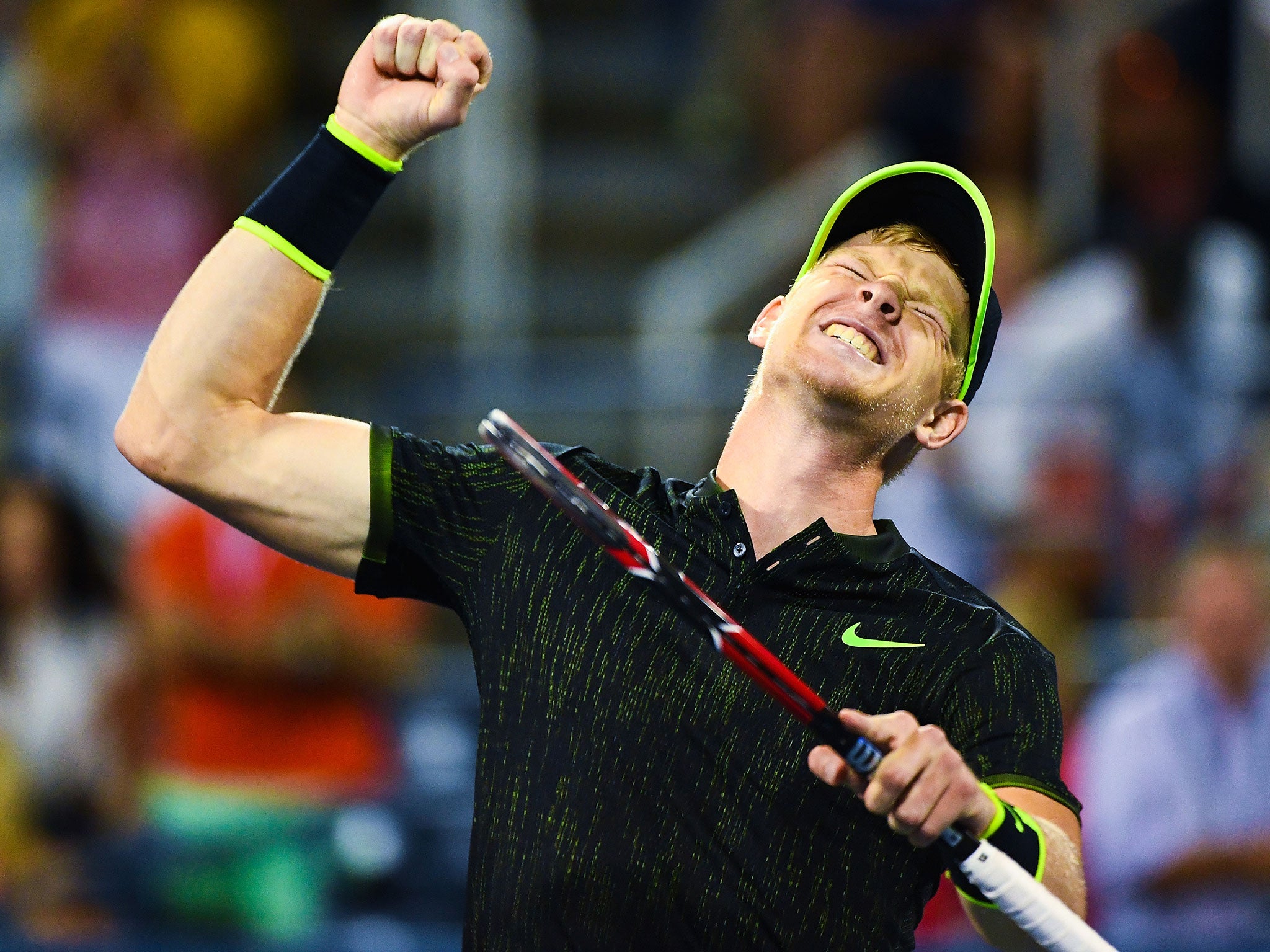 Kyle Edmund celebrates his victory over John Isner