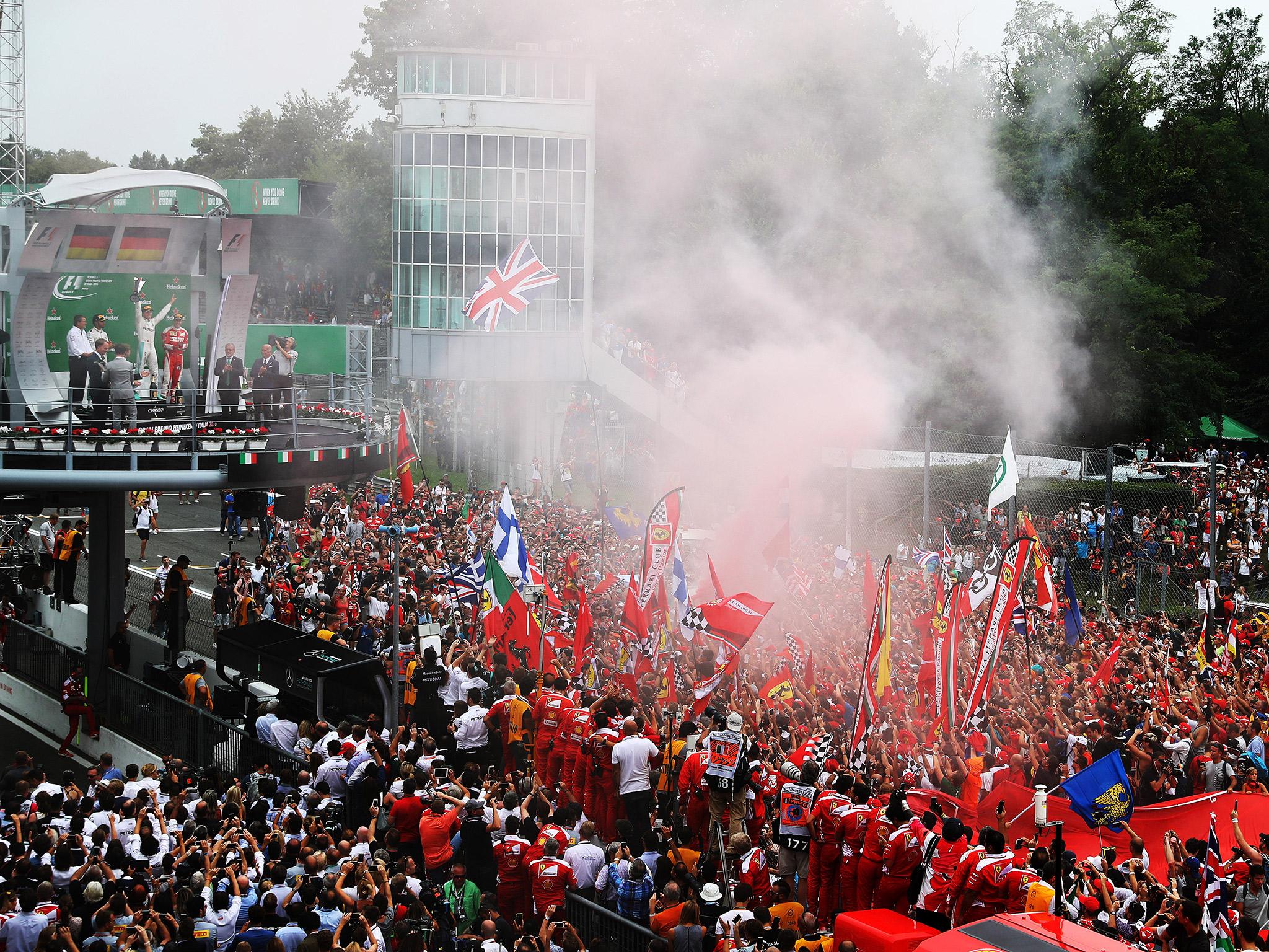 Fans flock to the podium as Rosberg celebrates